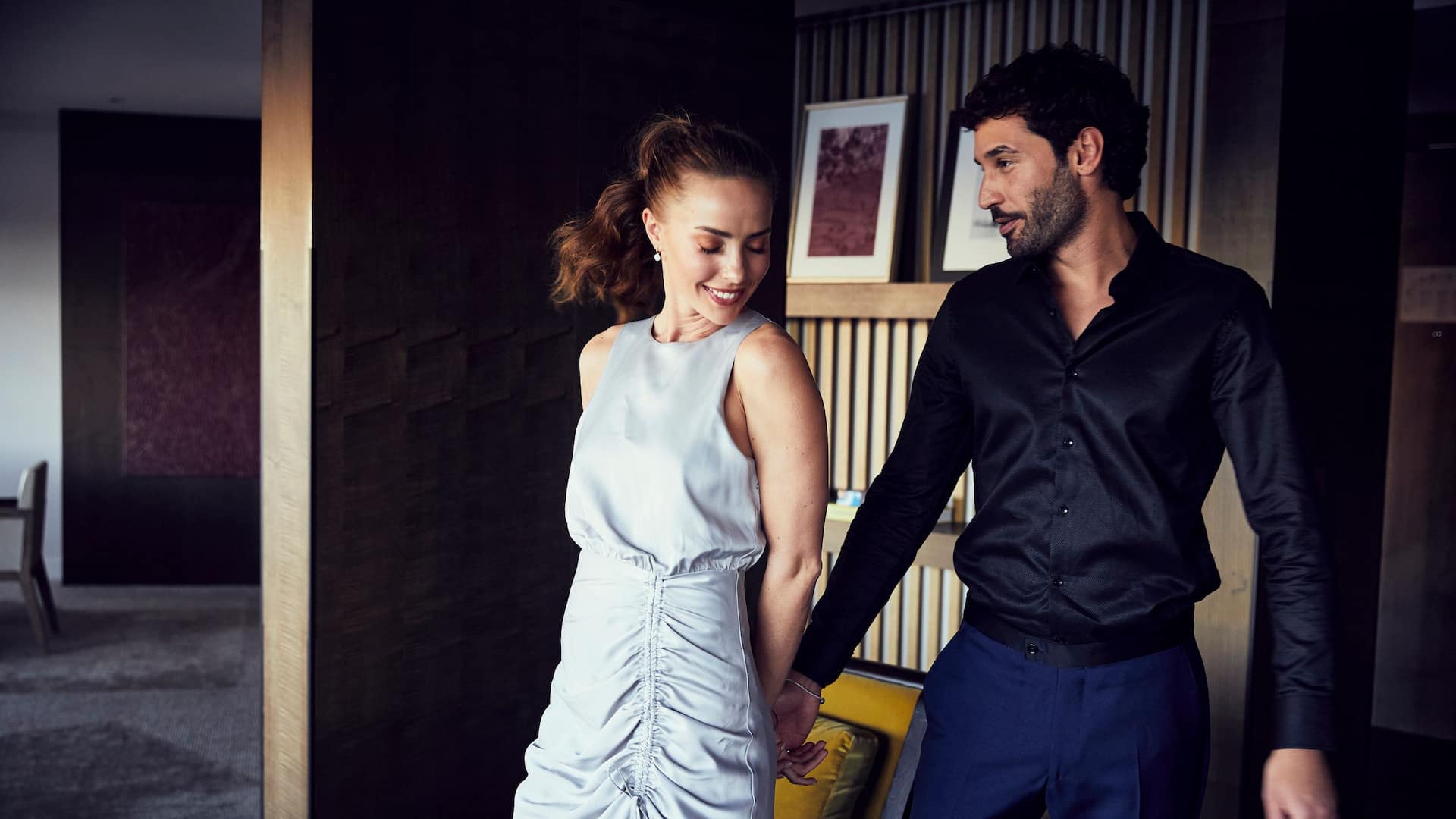 Global Suite Couple Holding Hands