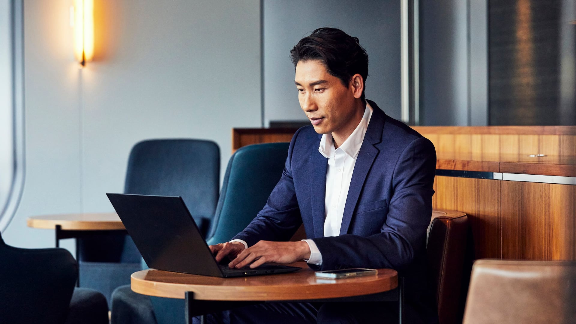 2 of 3 Global Man Sitting Laptop