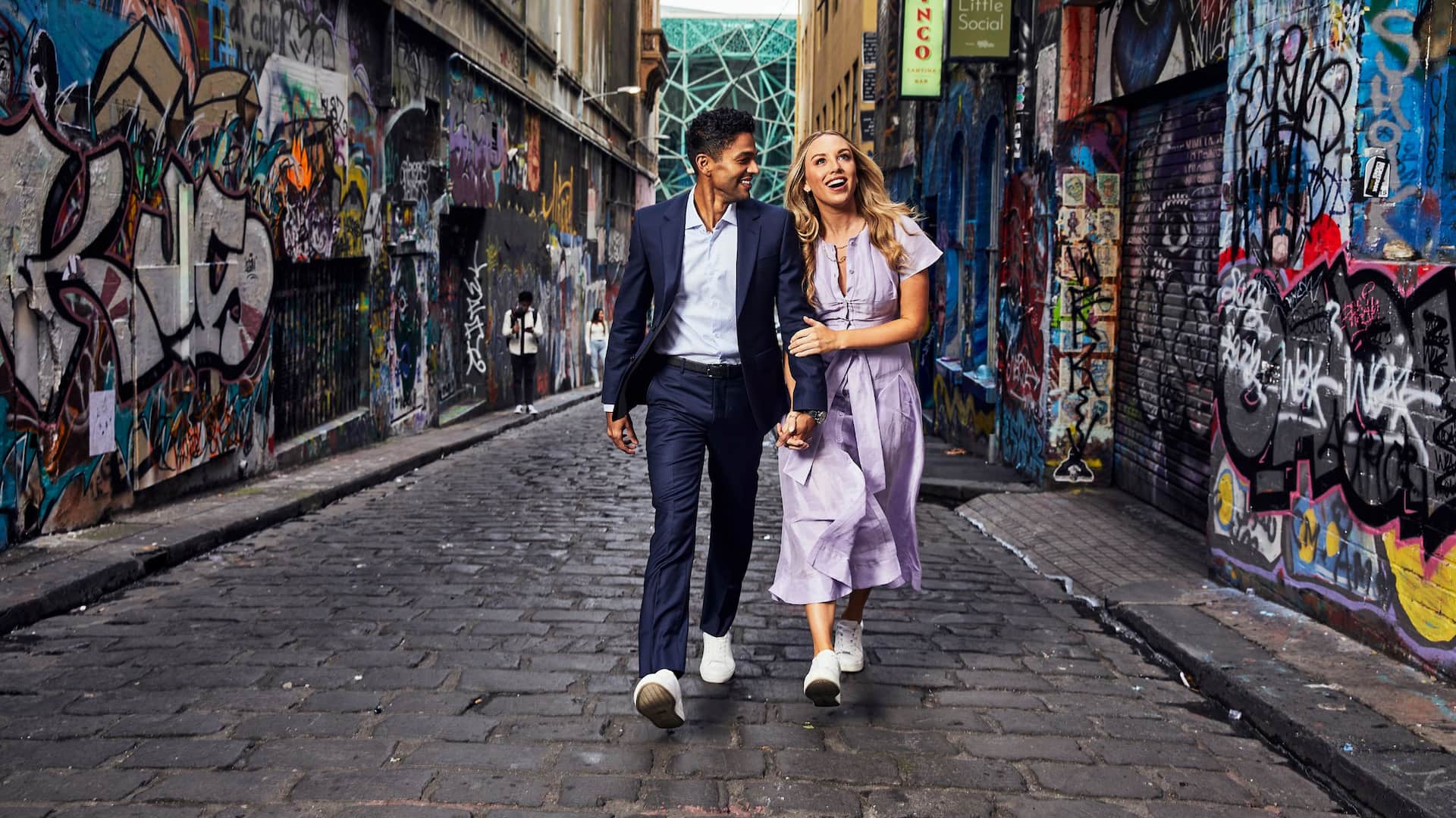 Global Couple Laneway Walking