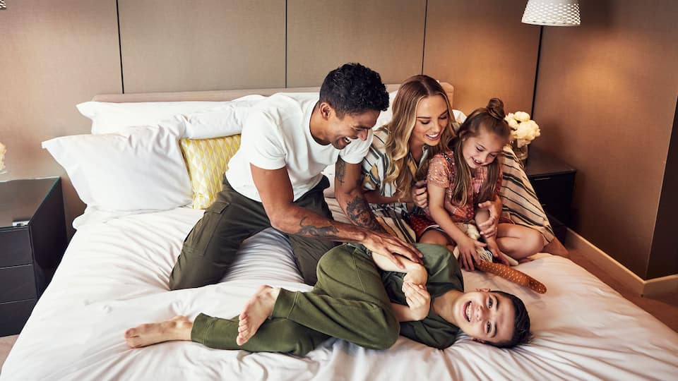 Family Bed Laughing