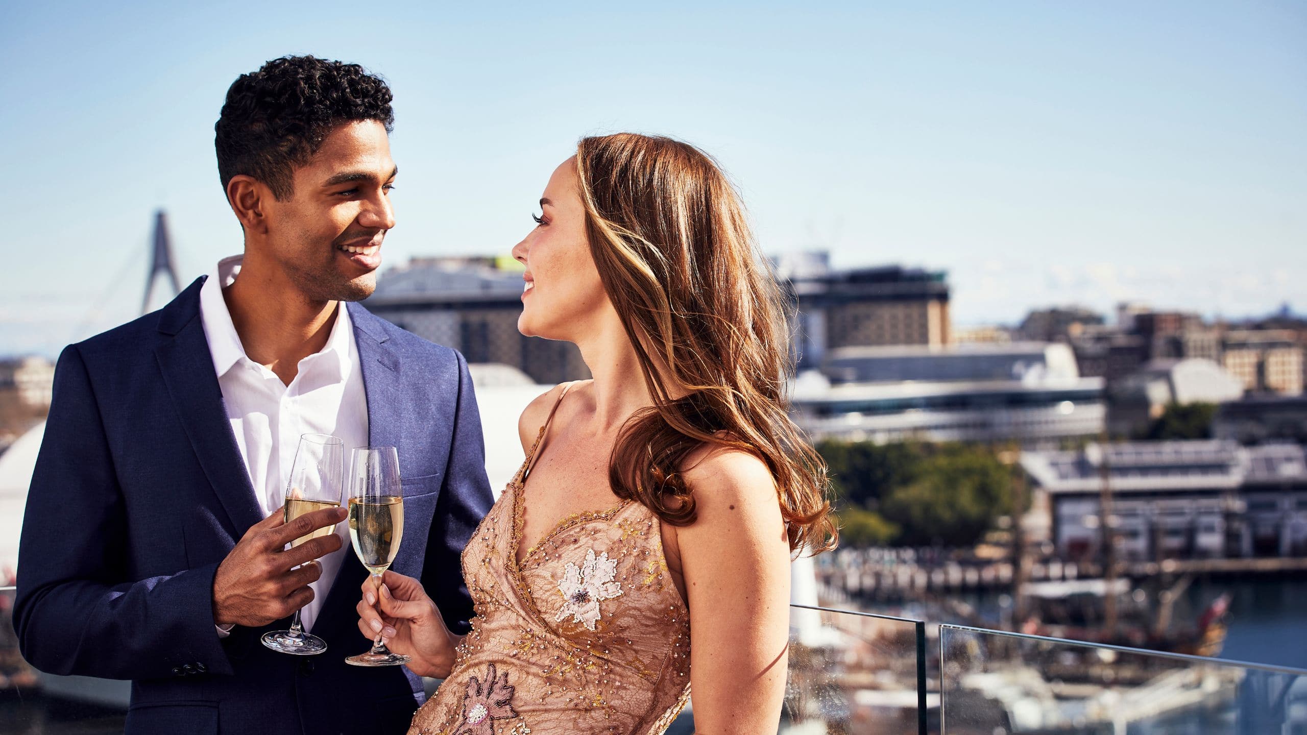 Global Couple Balcony View Champagne