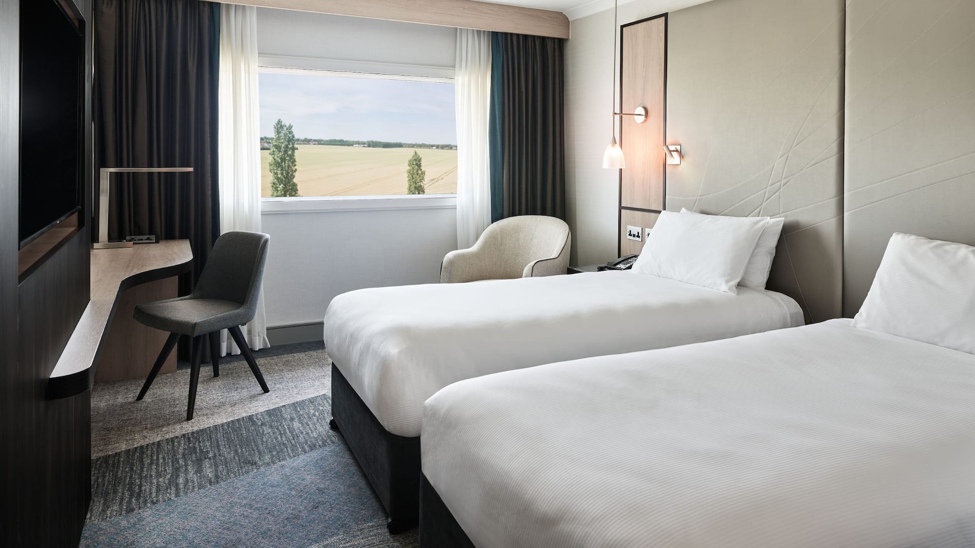 2/6 Room with two twin beds, modern decor, large window, high-floor view at hotel and parking Heathrow