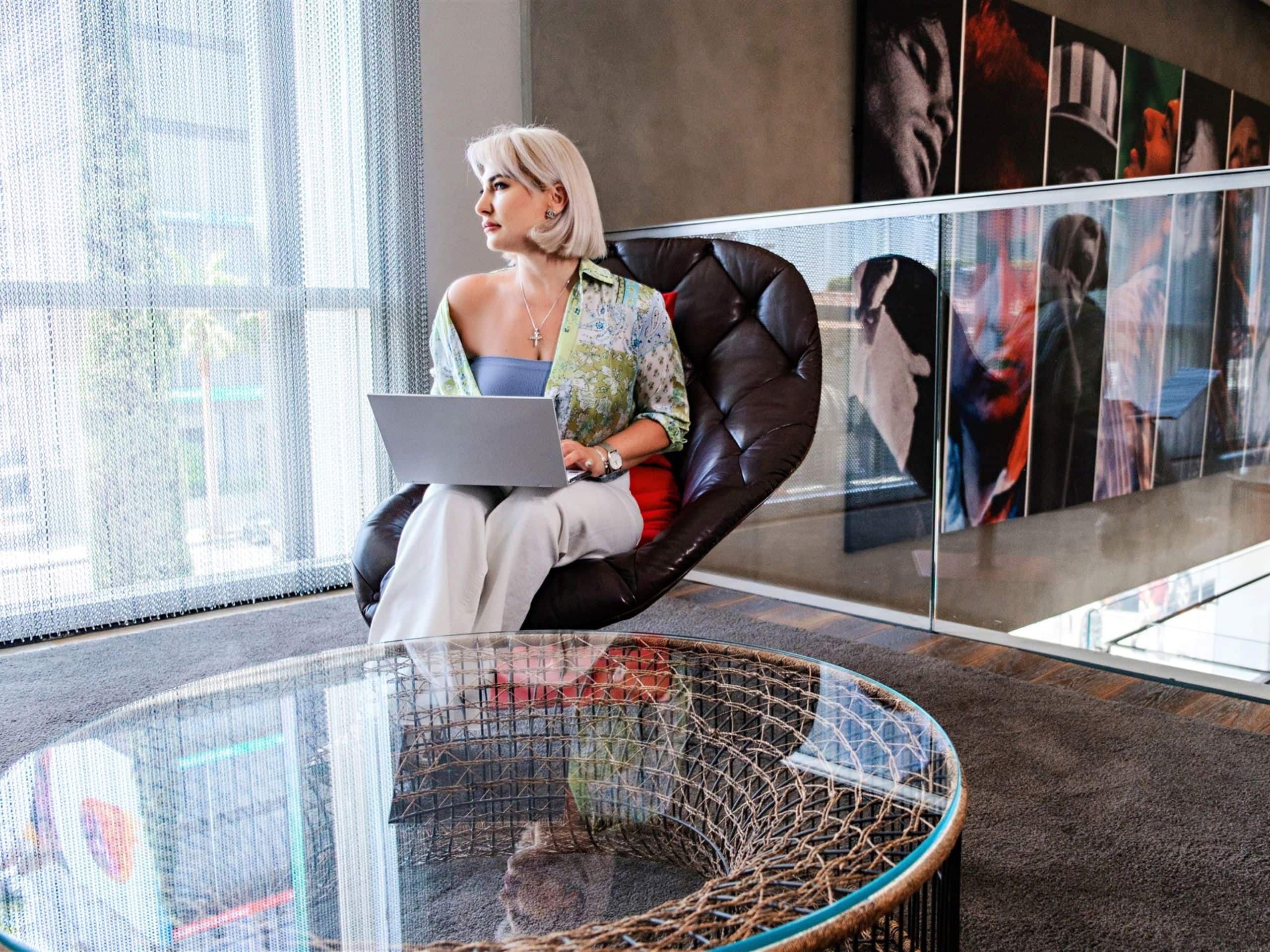 Andaz West Hollywood Woman Working On Laptop In Foyer