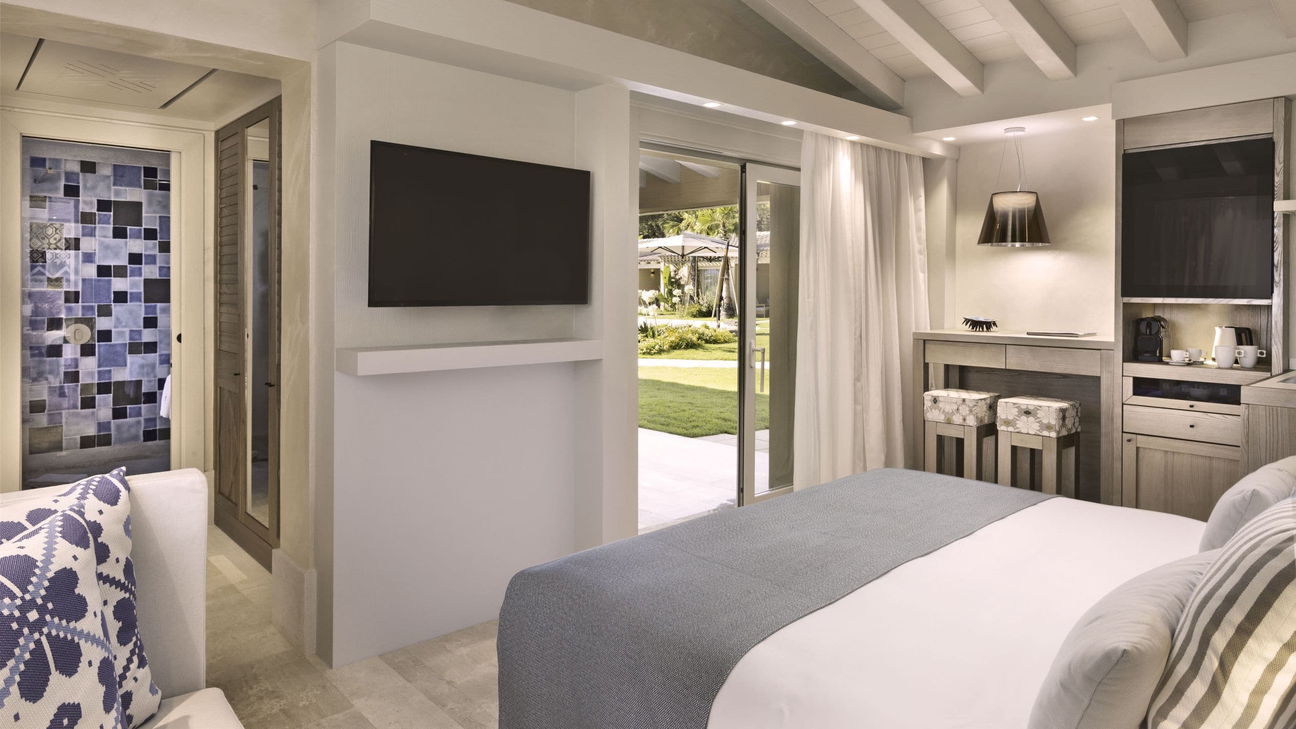 1 of 6 7Pines Resort Sardinia Laguna Deluxe Room Bedroom Layout