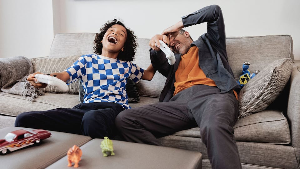 Dad Son Gaming Couch Living Room