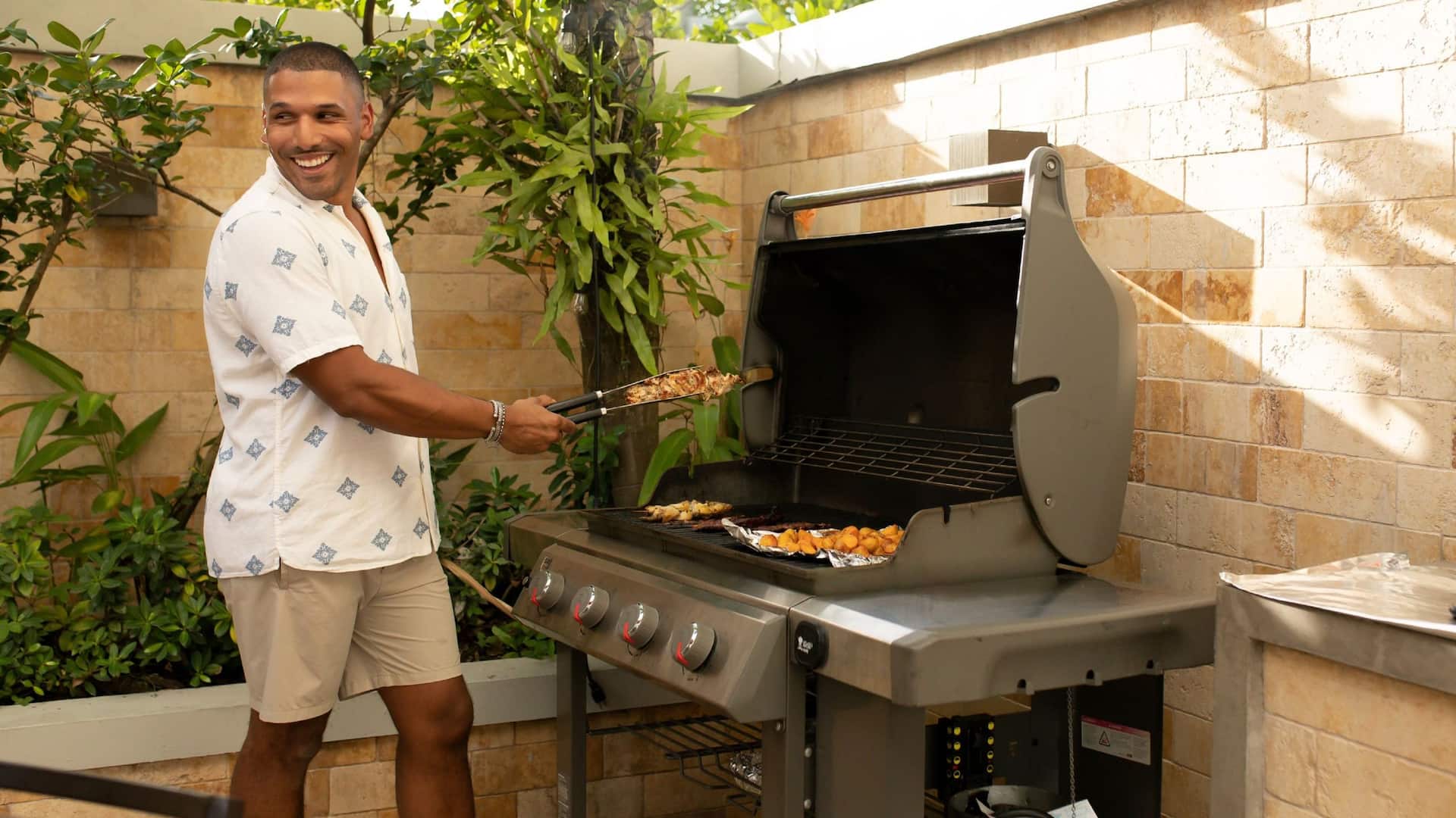 Hyatt House San Juan Man Grilling