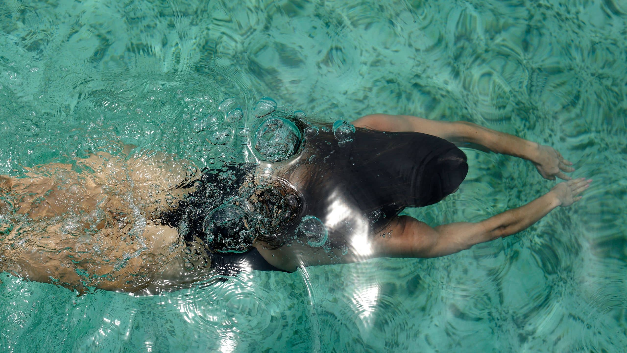 Alila Kothaifaru Maldives Woman Swimming