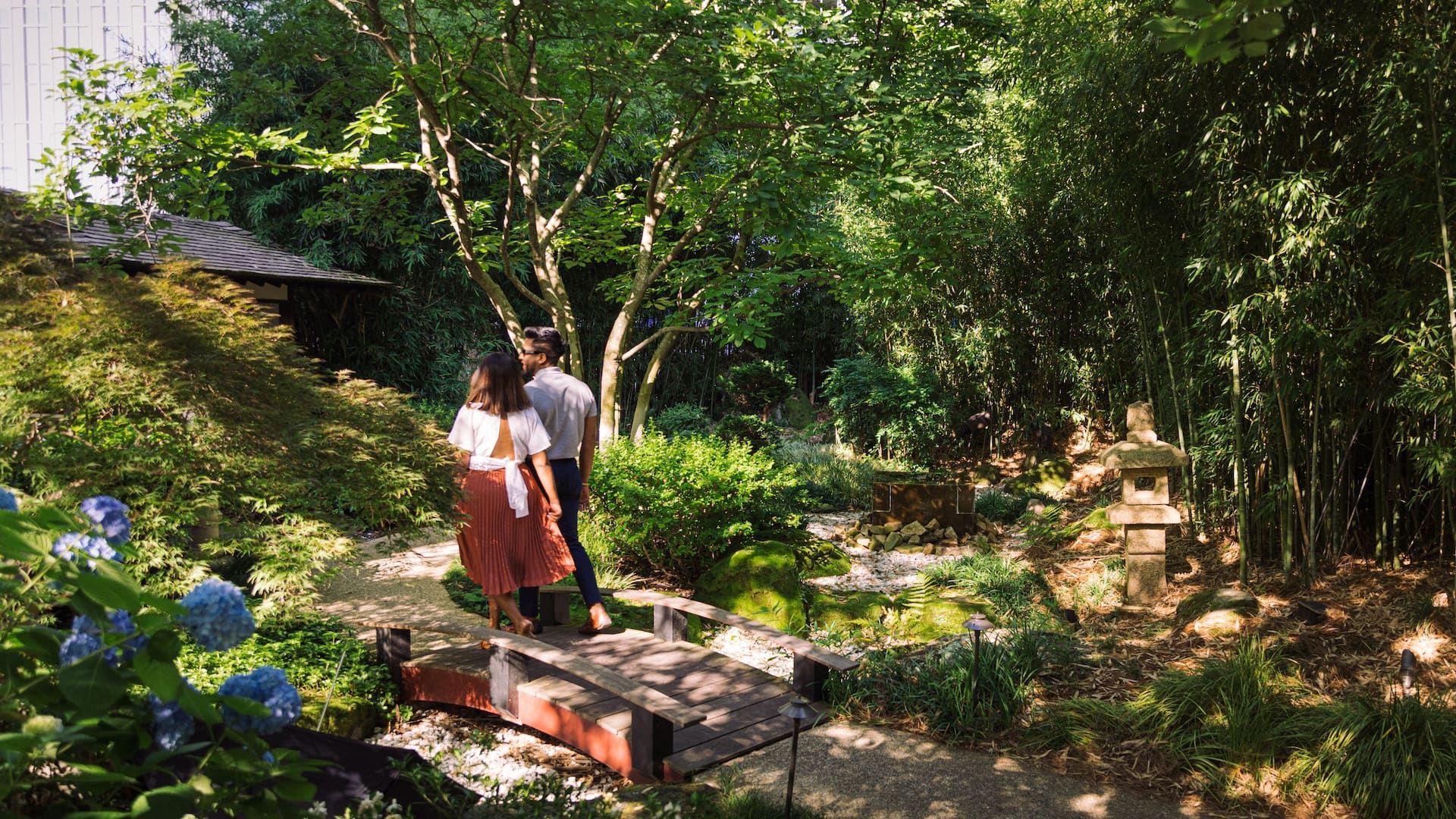 Grand Hyatt Atlanta in Buckhead Back Of Couple Walking In Zen Garden