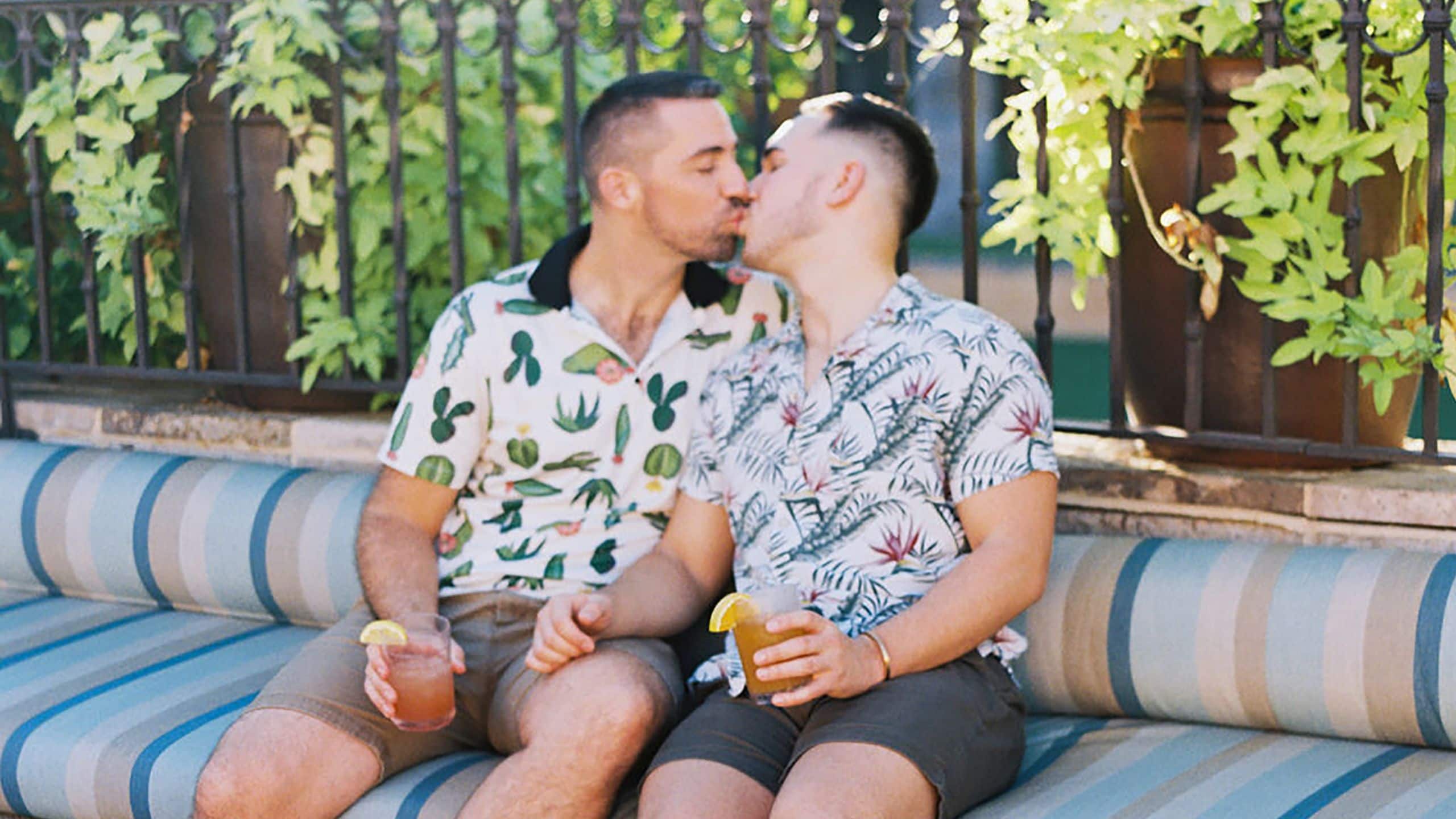 Royal Palms Resort and Spa Lgbtq Couple Lounging Kiss
