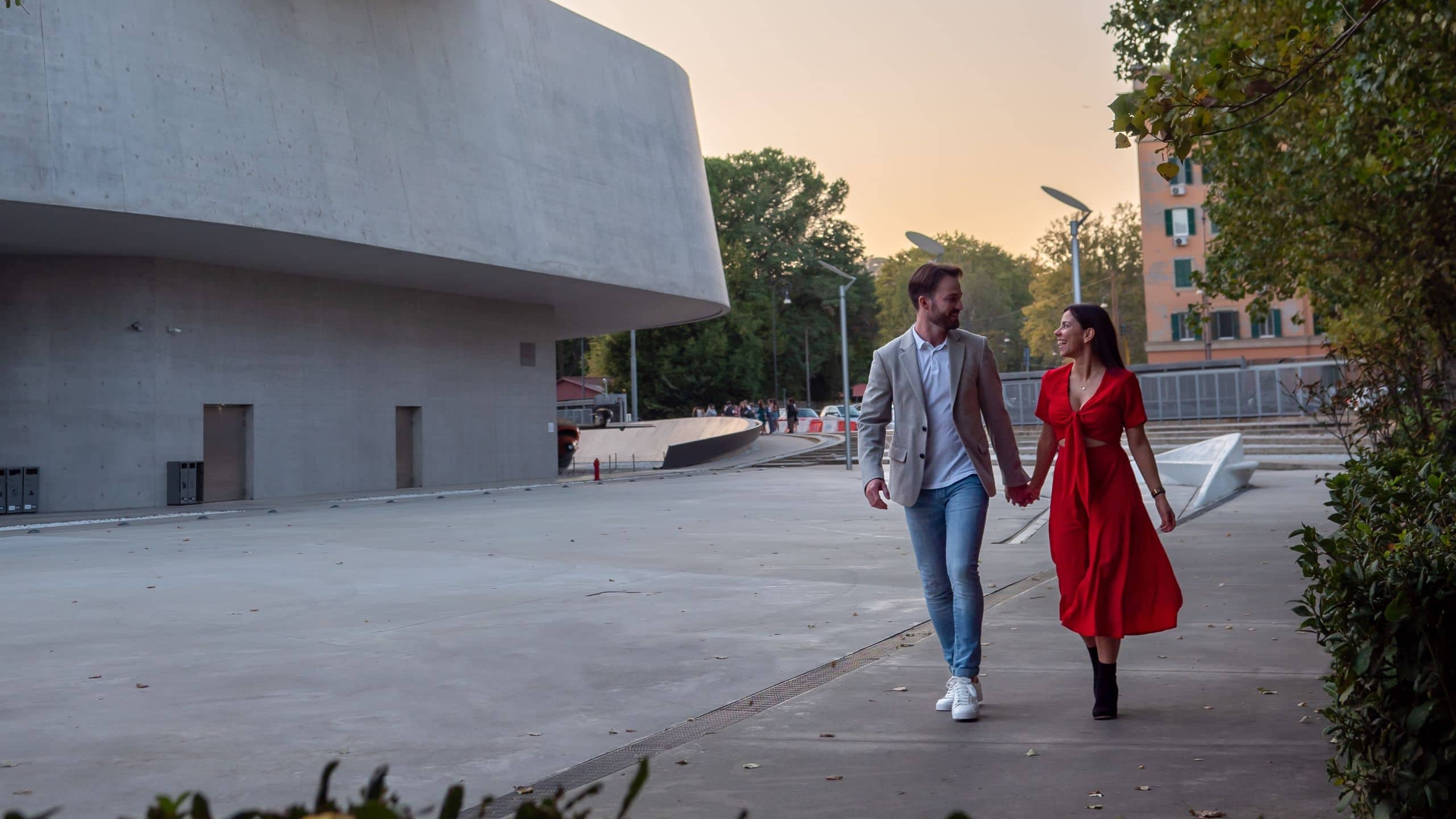 The Tribune Couple Holding Hands Outdoors