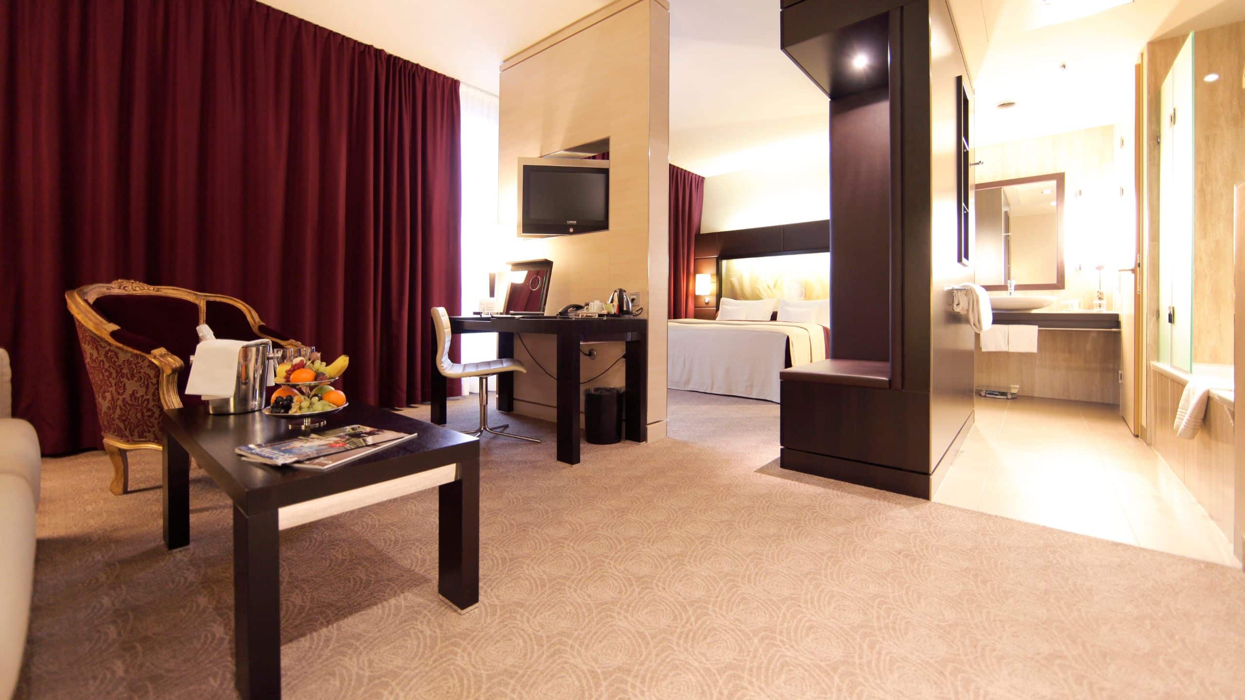 4 of 5 Lindner Hotel am Belvedere Guestroom Living Area