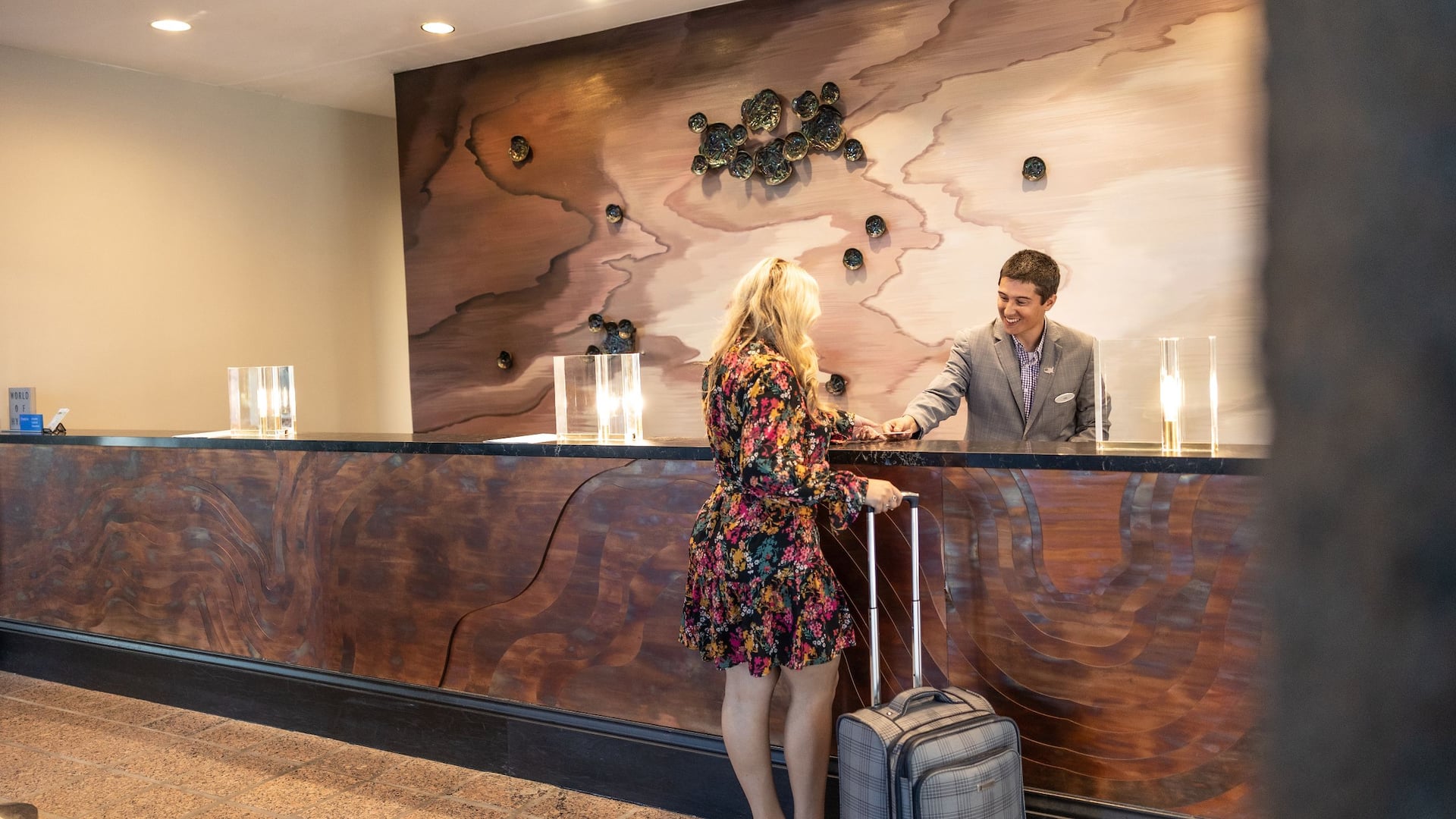 Hyatt Regency Houston West Woman Checking In