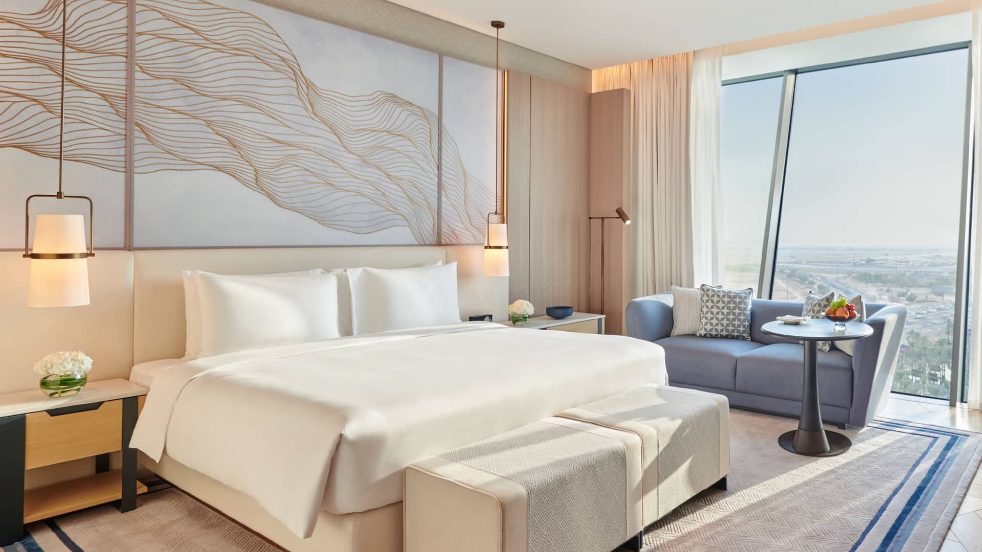Grand King rooms at Grand Hyatt Kuwait featuring custom furnishings and original art