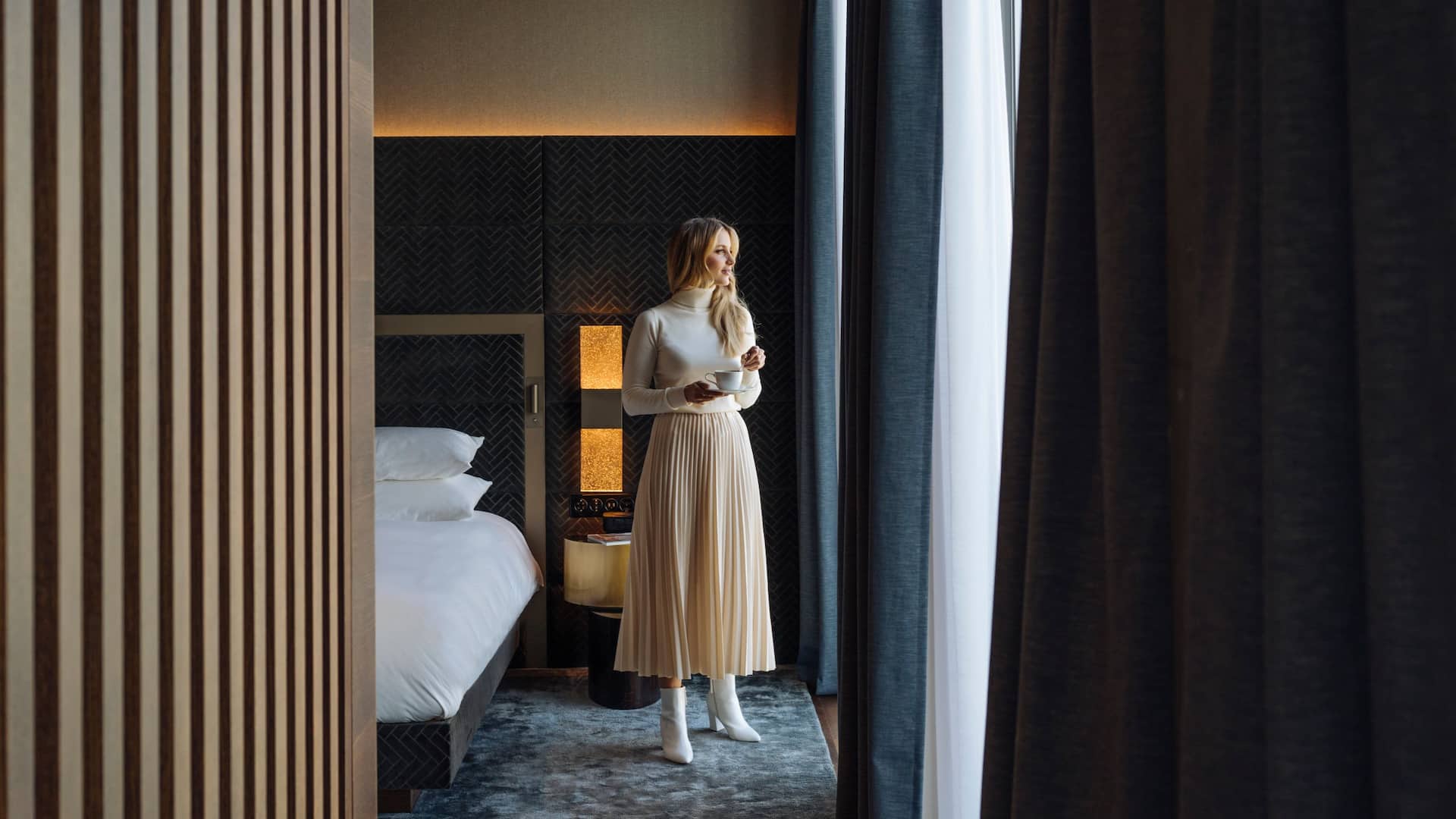 Hyatt Regency Zurich Airport The Circle Presidential Suite Woman Looking Out Window