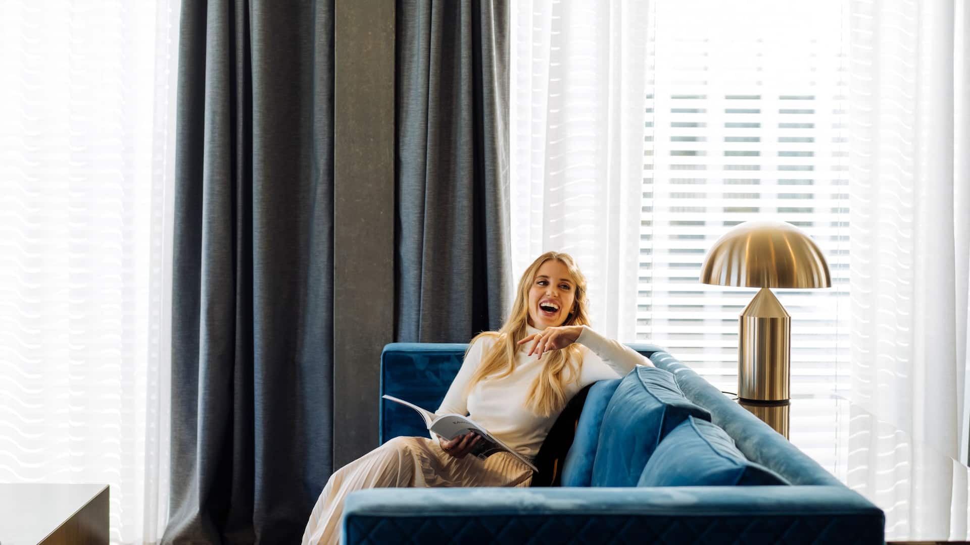 Hyatt Regency Zurich Airport The Circle Presidential Suite Living Room Woman Sitting