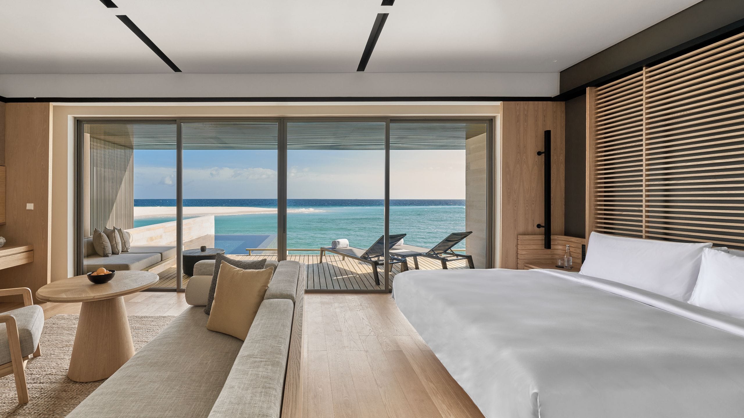 Alila Kothaifaru Maldives Sunrise Water Villa Bedroom