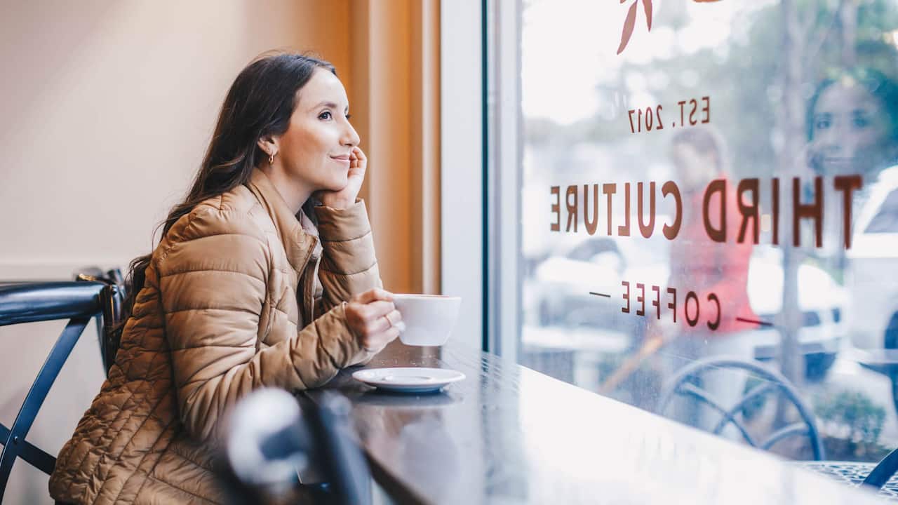 Third Culture Coffee Shop Woman Sitting