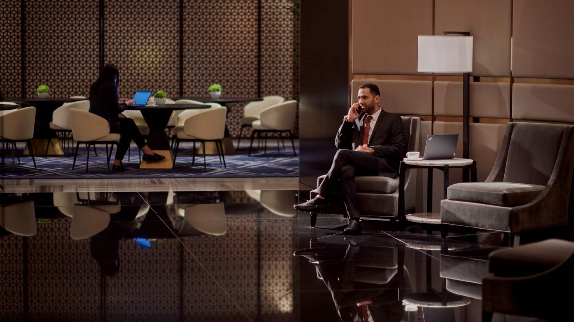 Grand Hyatt Kuwait Gallery Seating Area Businessman