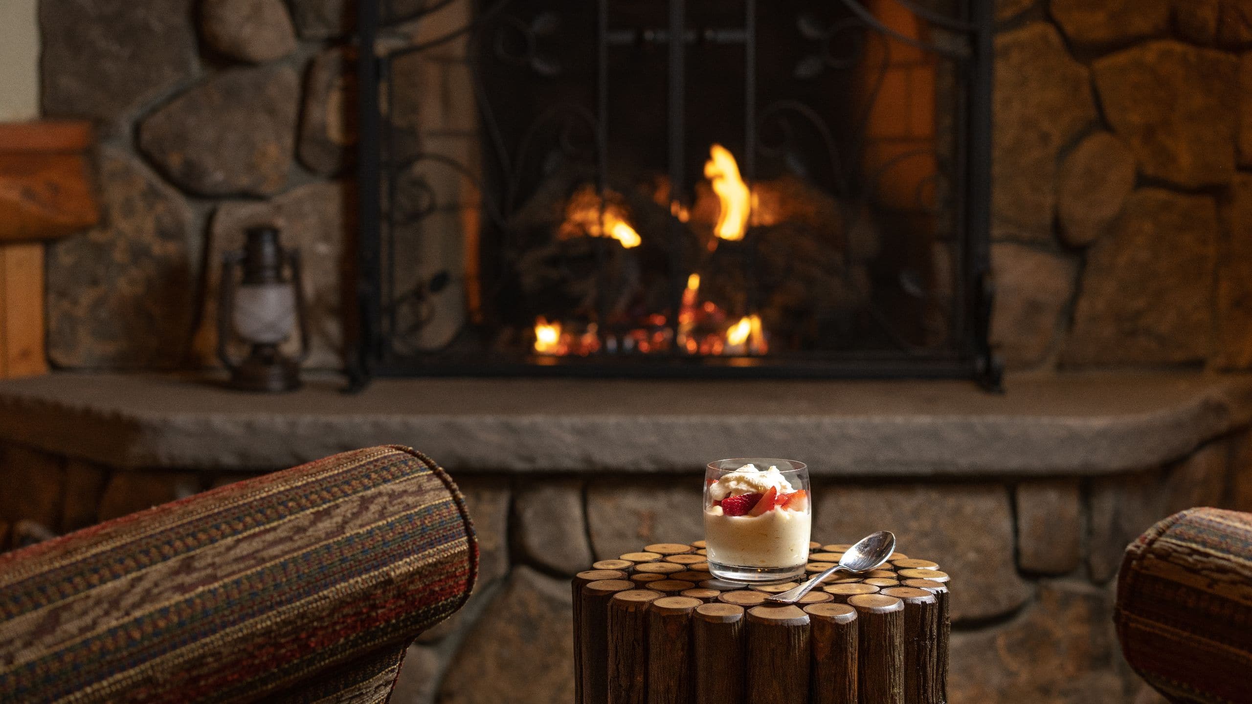 6 of 6 The Chatwal Lodge Rec Room Fireplace Dessert
