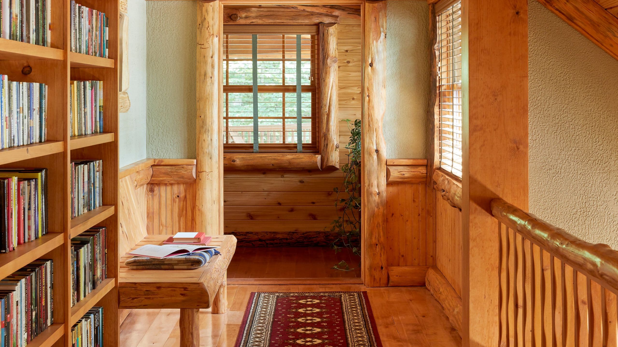 5 of 8 The Chatwal Lodge Sunset Hallway Books