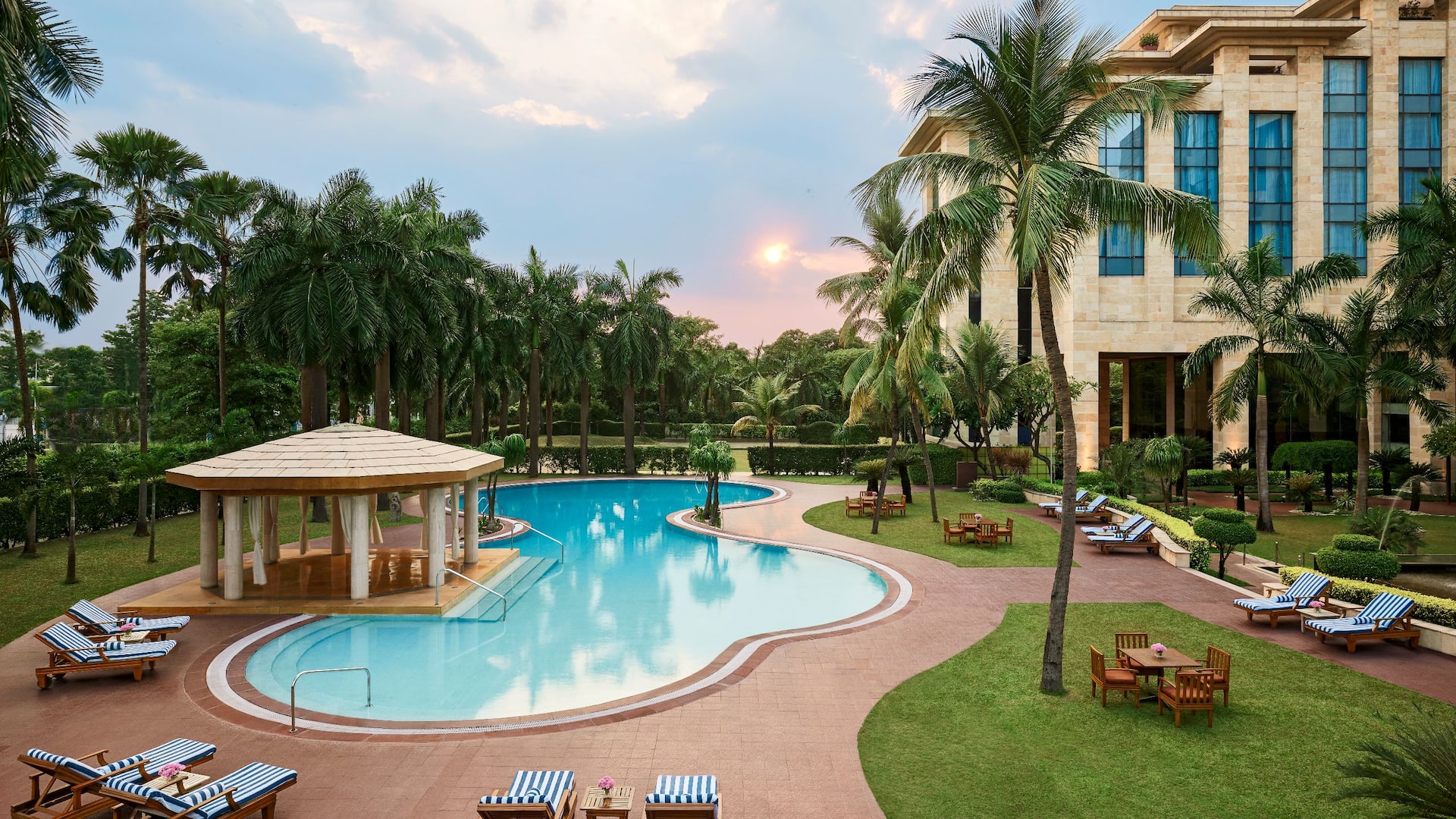 Hyatt Regency Kolkata Pool Palm Trees Sunset