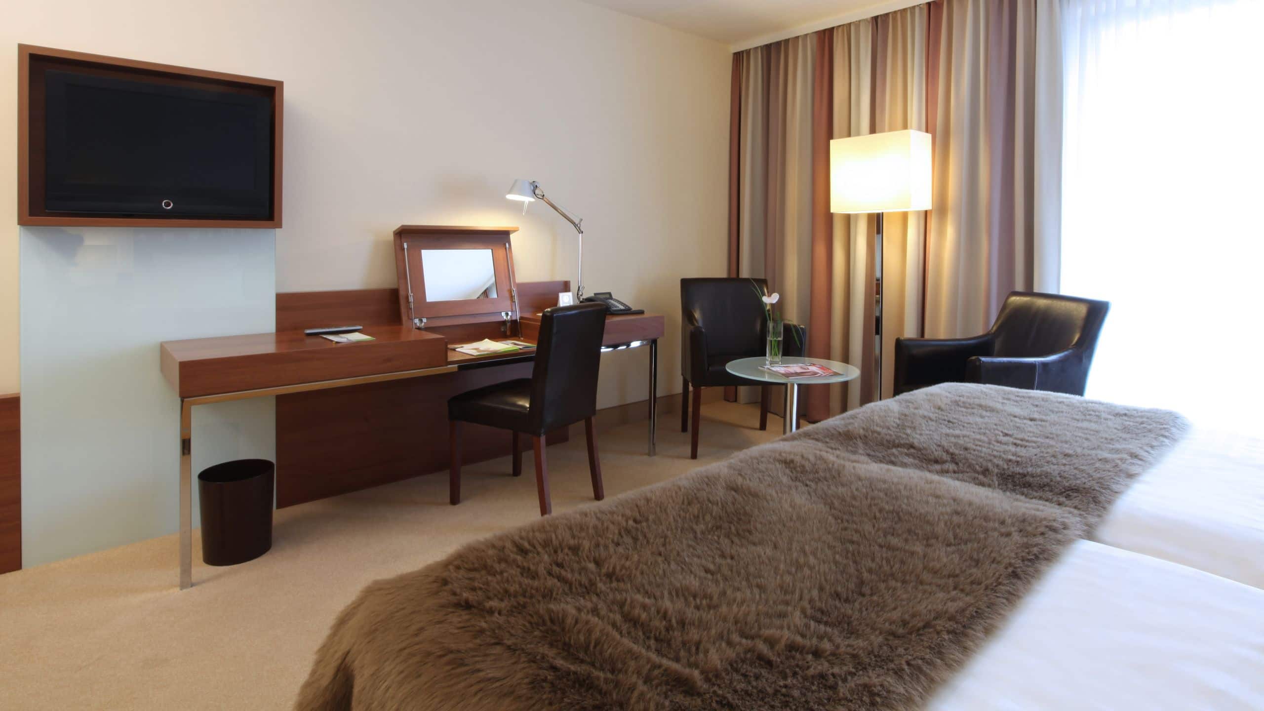 1 of 5 Lindner Hotel Am Michel King Bed Deluxe Desk