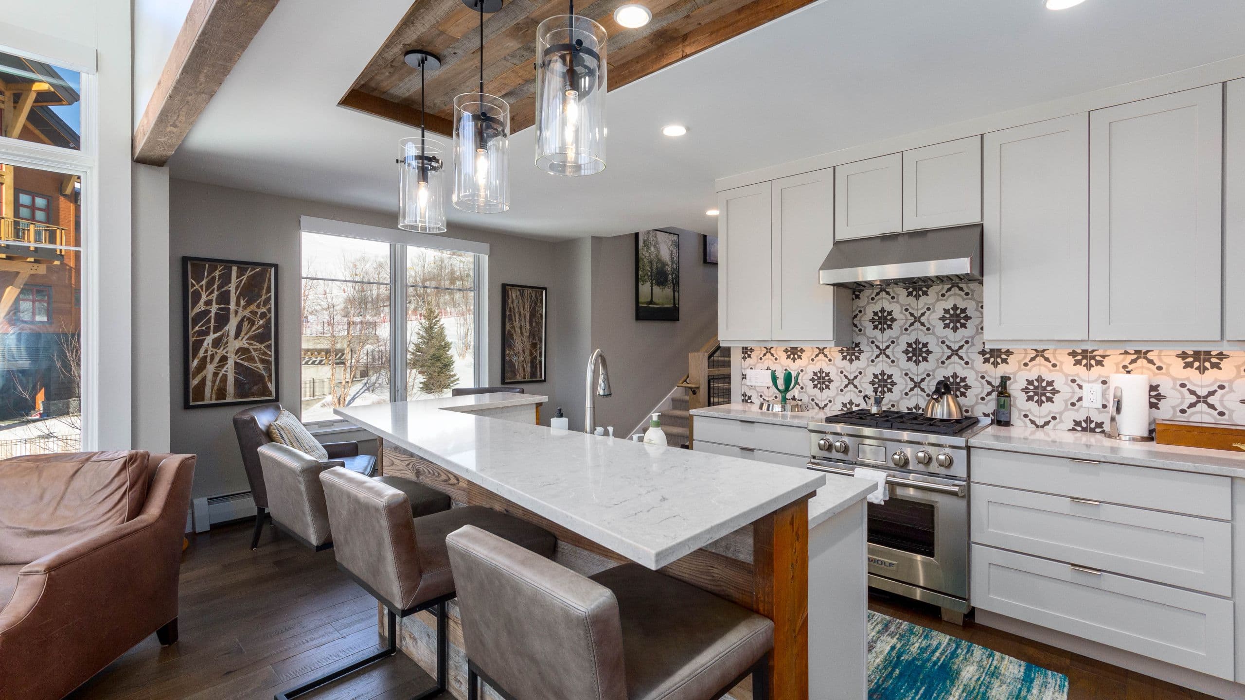 3 of 5 The Lodge at Spruce Peak Townhome Kitchen Counter Stools