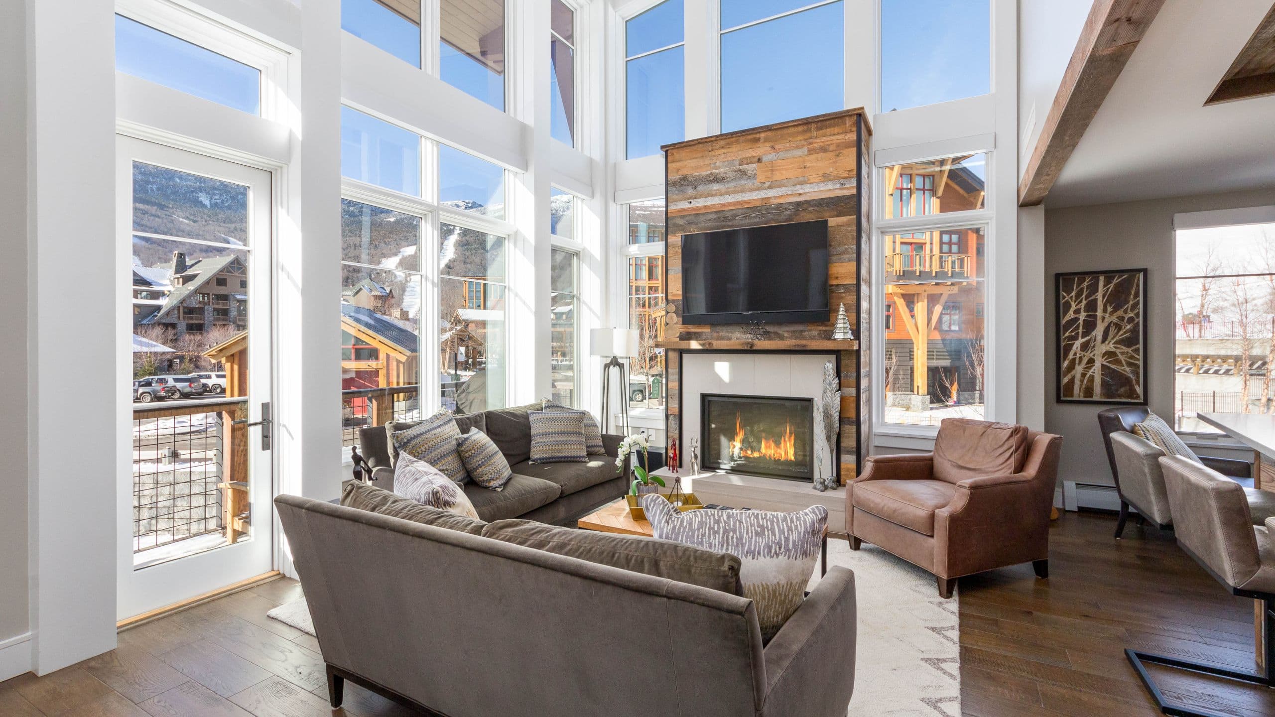 1 of 5 The Lodge at Spruce Peak Townhome Living Area Seating Television