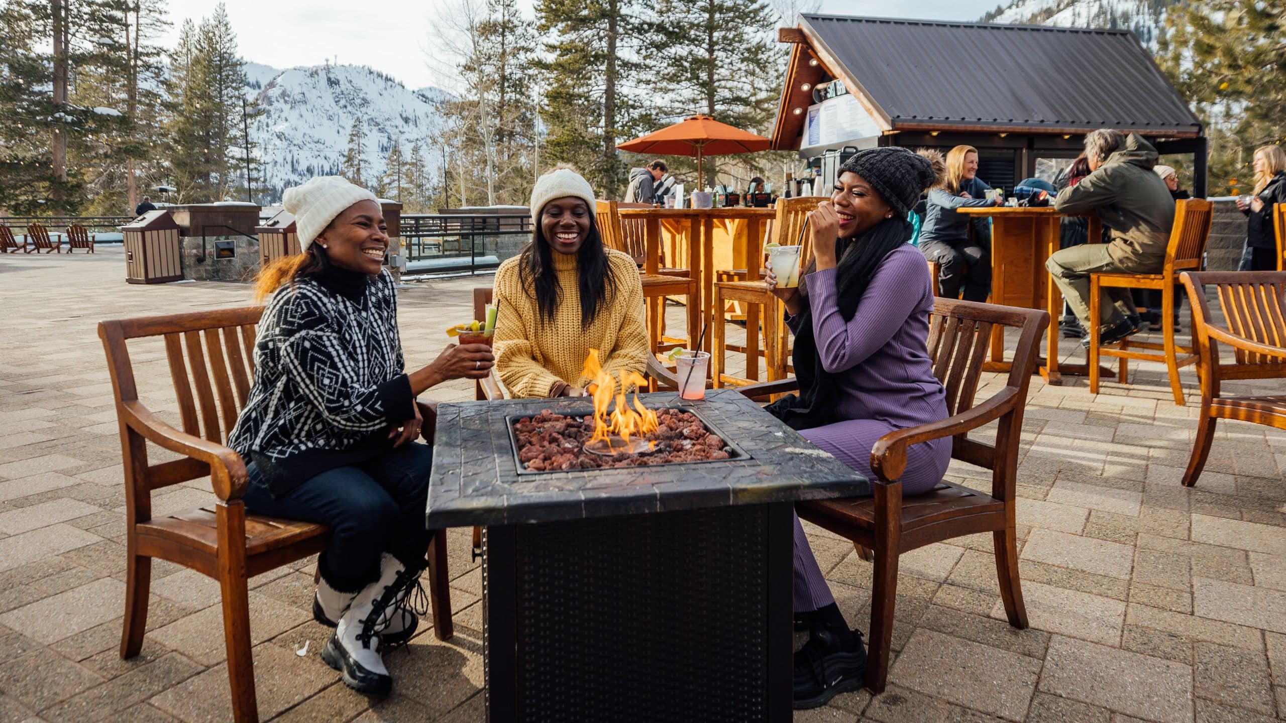 Everline Resort & Spa Guests Around Firepit