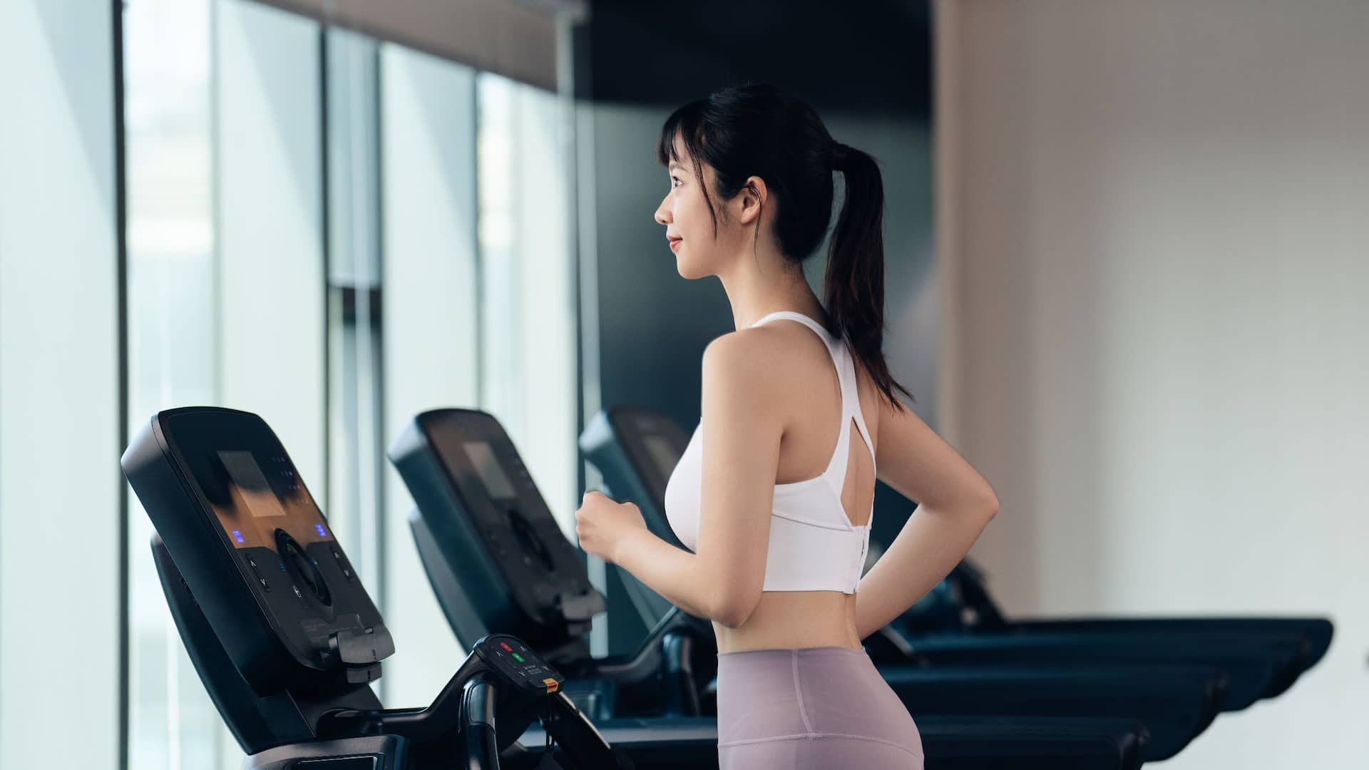 Hyatt Place HP_P0502 Woman Fitness Center Treadmill