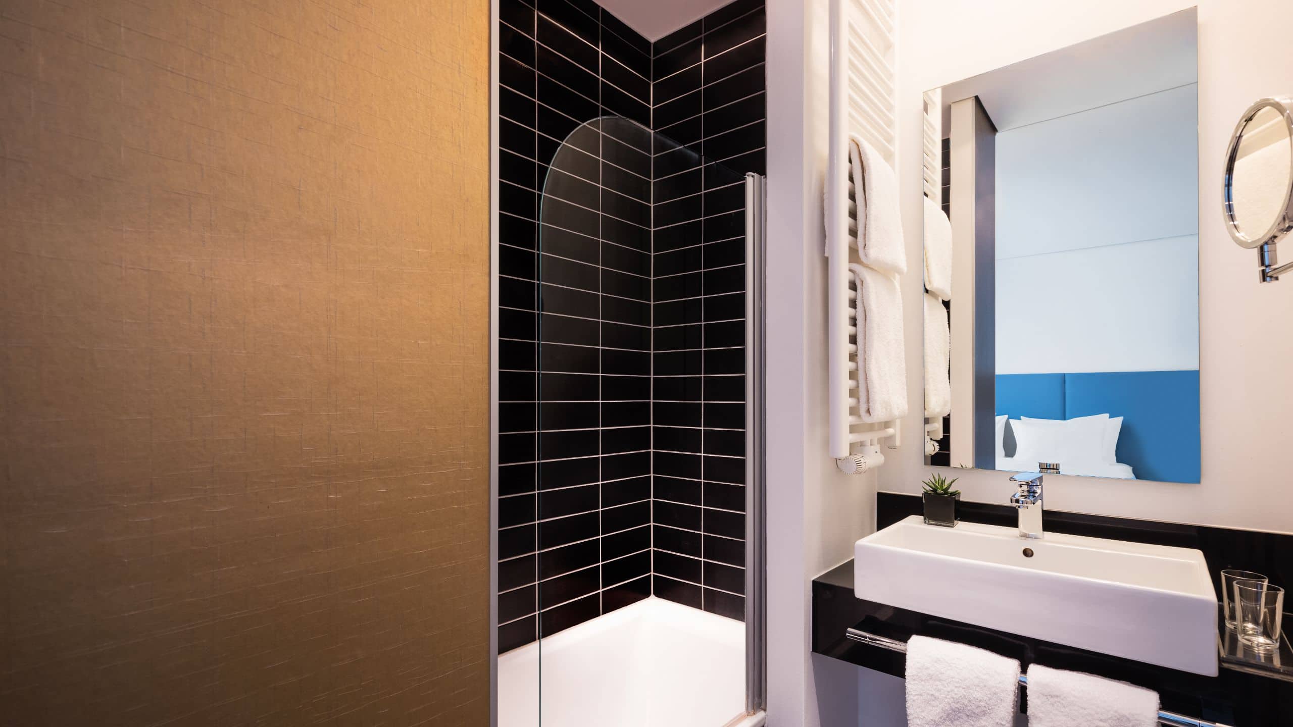 7 of 7 Lindner Hotel & Sports Academy One King Bed Deluxe Bathroom