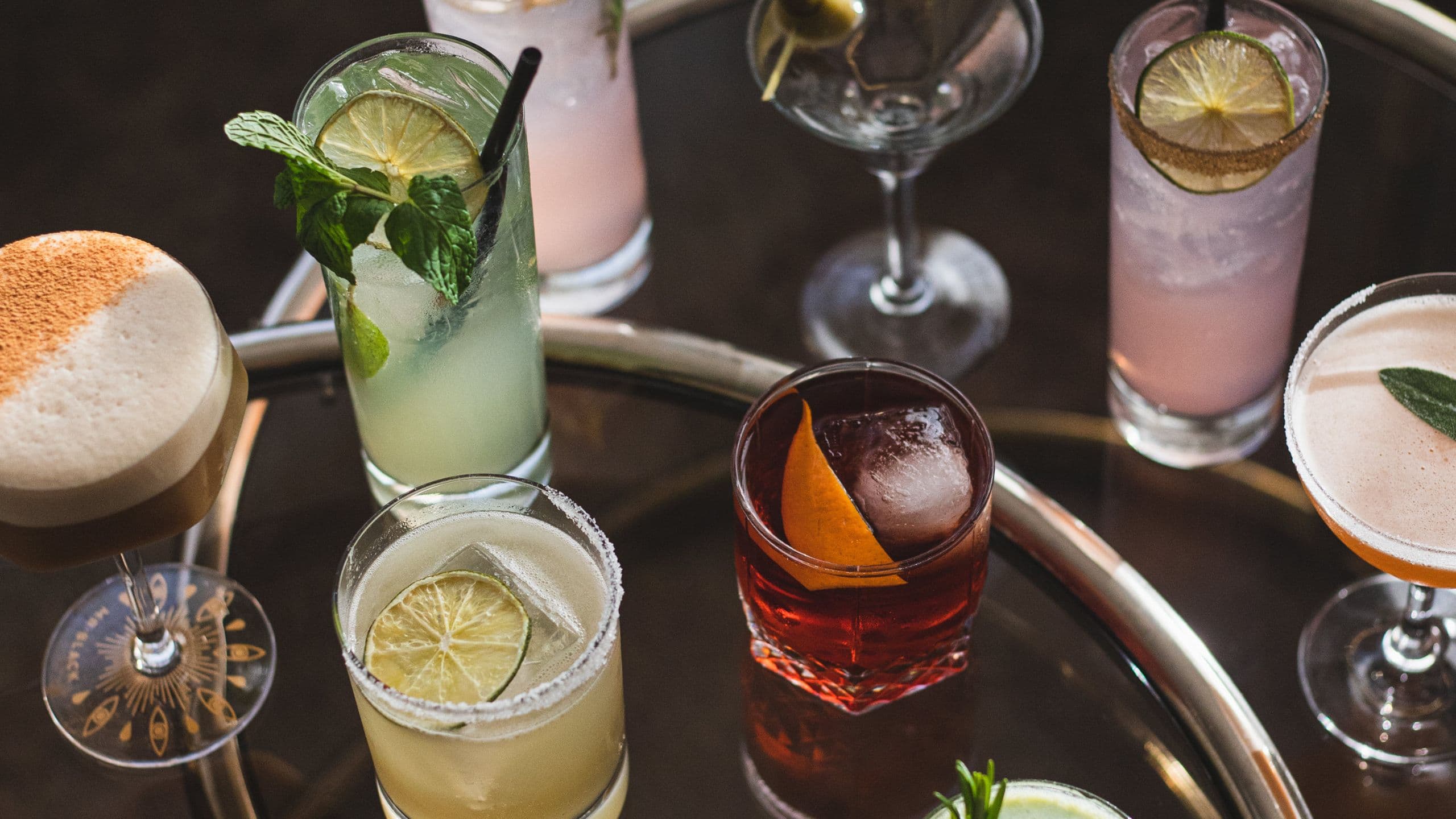 The Laurel Inn Laureate Bar Cocktails On Tables