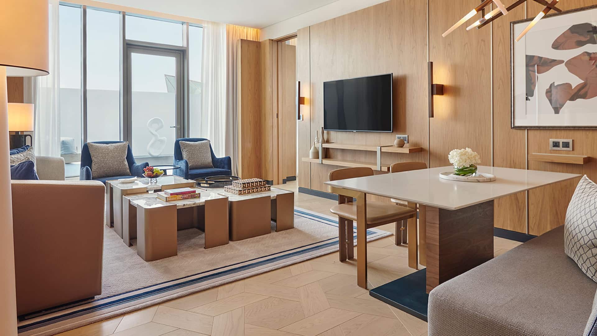 Grand Deluxe Suite with private landscaped garden terrace, separate living room and bedroom