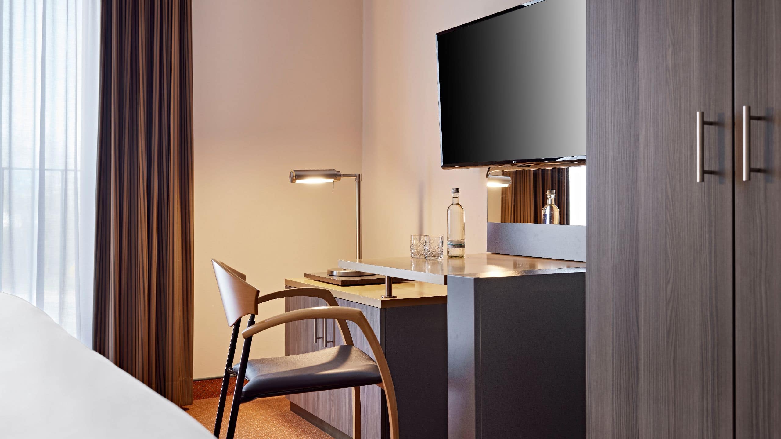 3 of 6 Lindner Hotel BayArena One Bedroom Suite TV