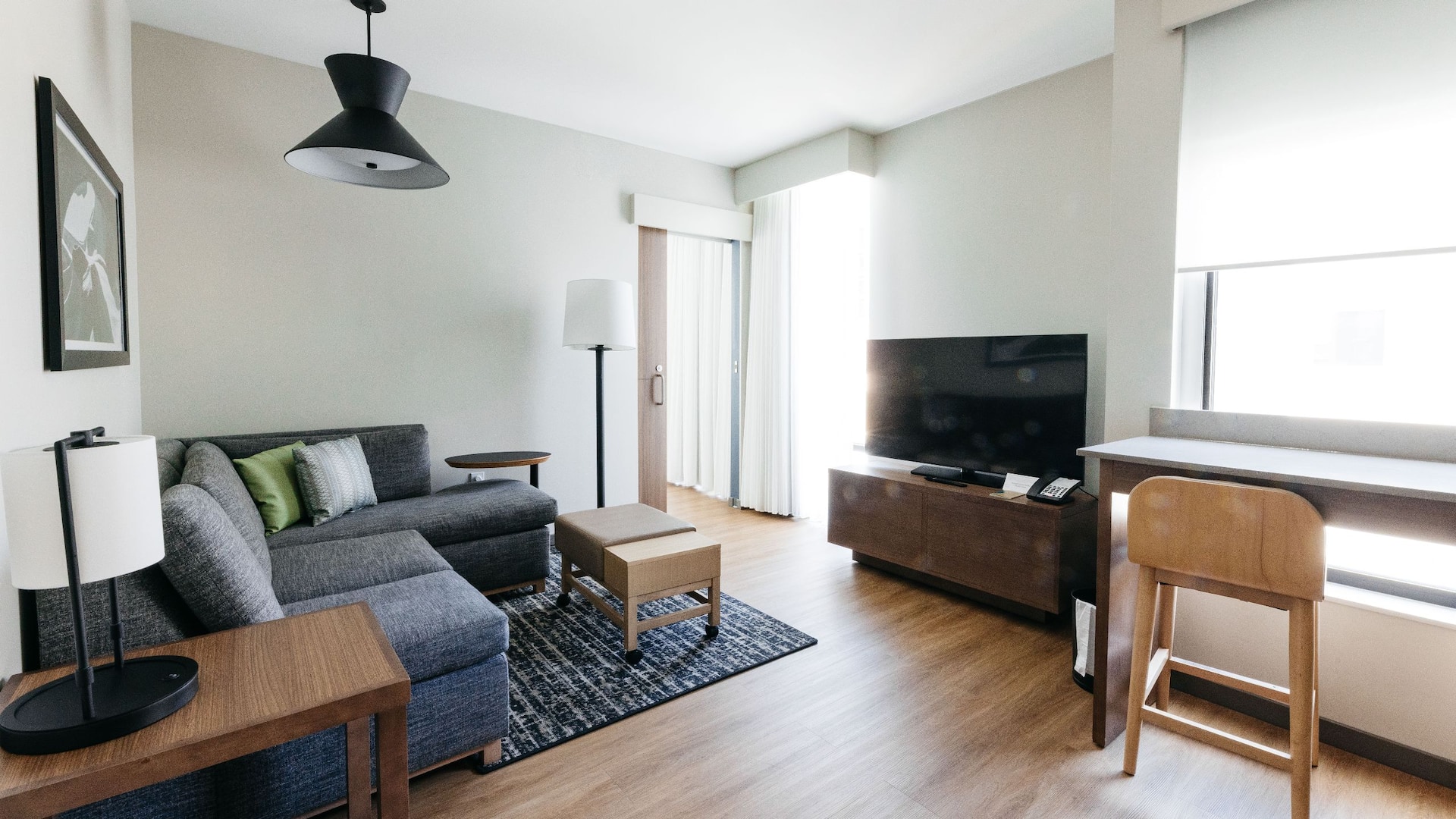 Hyatt Place Phoenix / Downtown Suite Living Room Seating Television