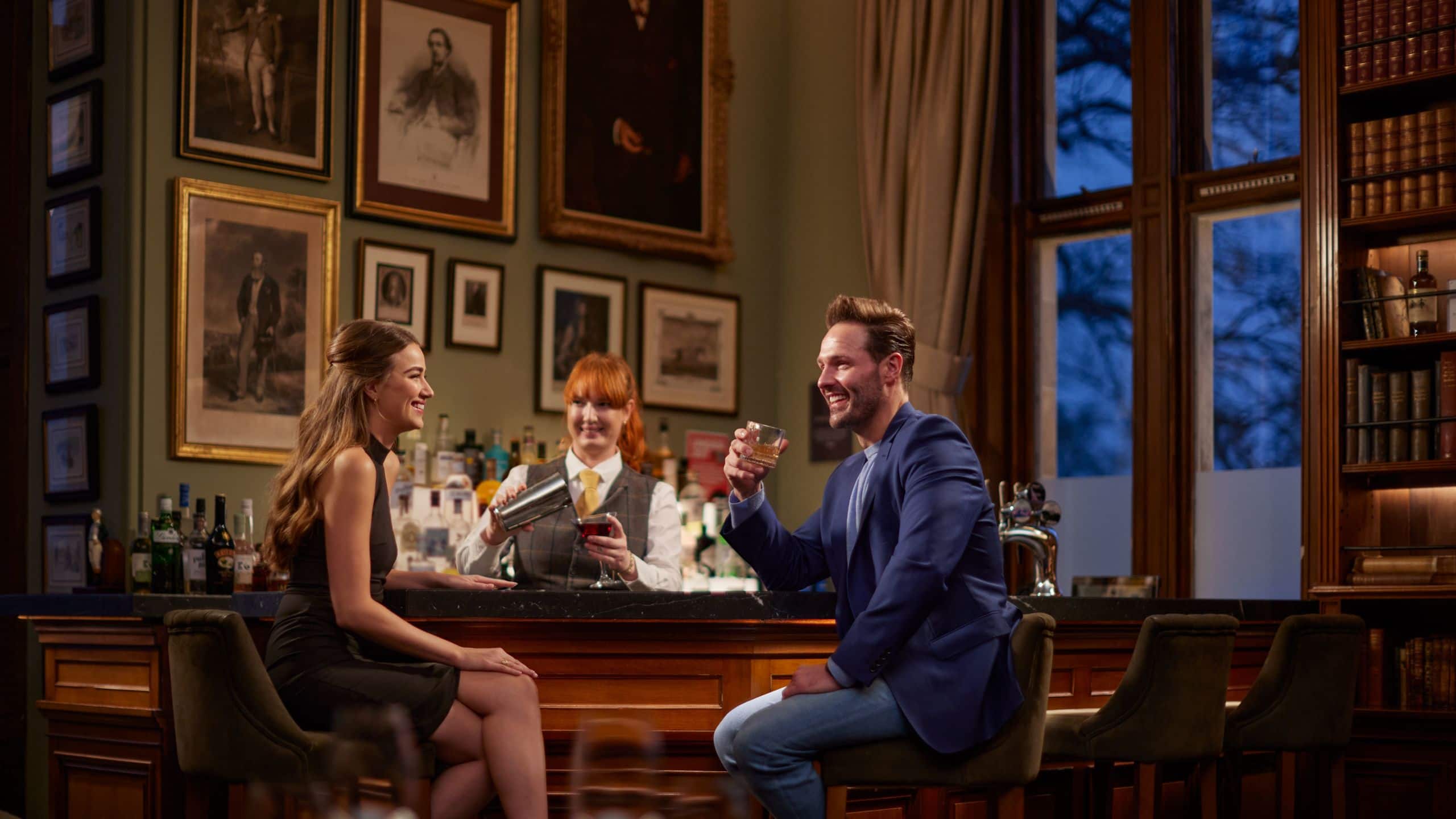 SCHLOSS Roxburghe Bar 1745 Couple With Bartender