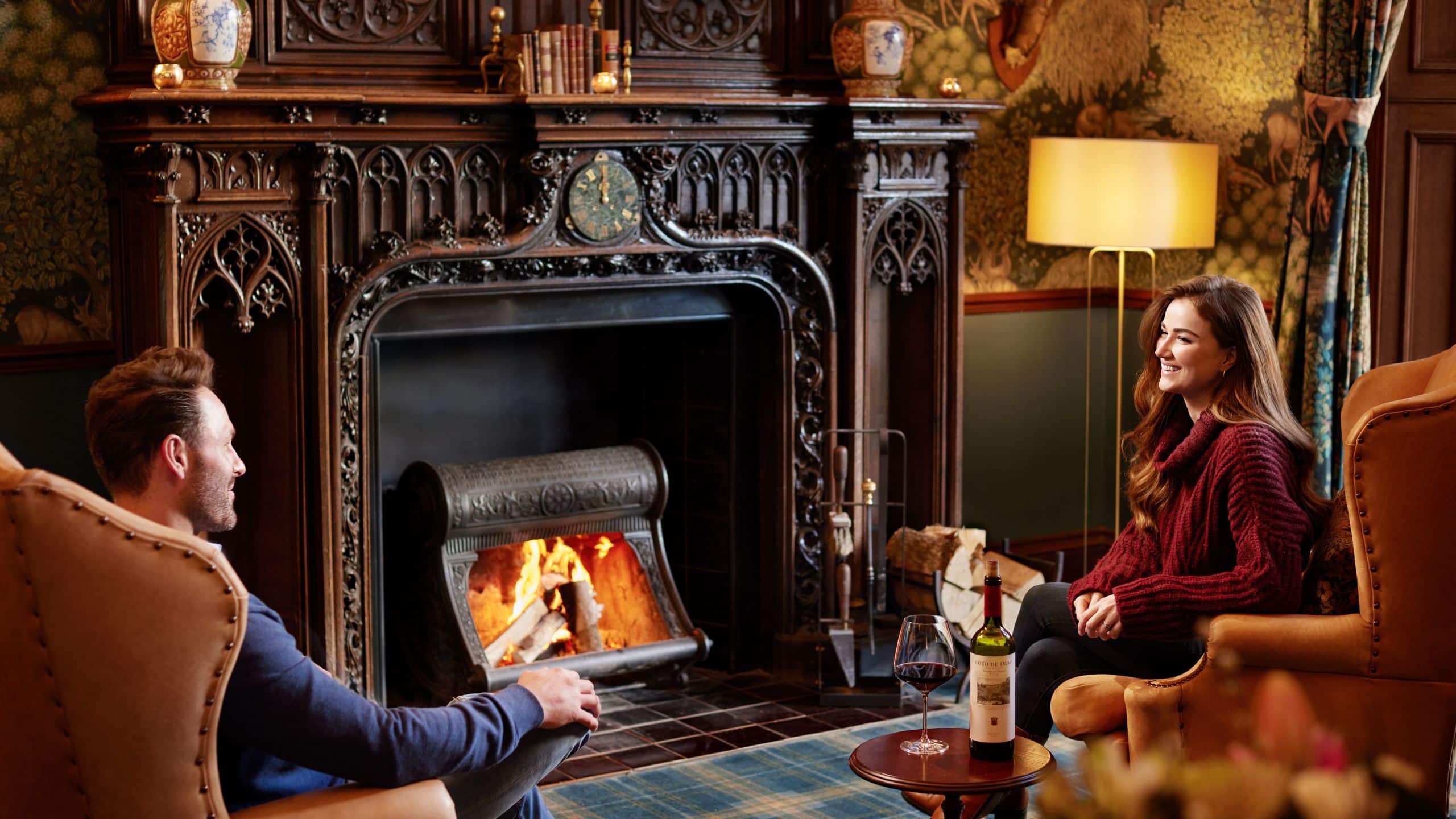 1 of 1 SCHLOSS Roxburghe Common Areas Fireplace Hall Couple Sitting