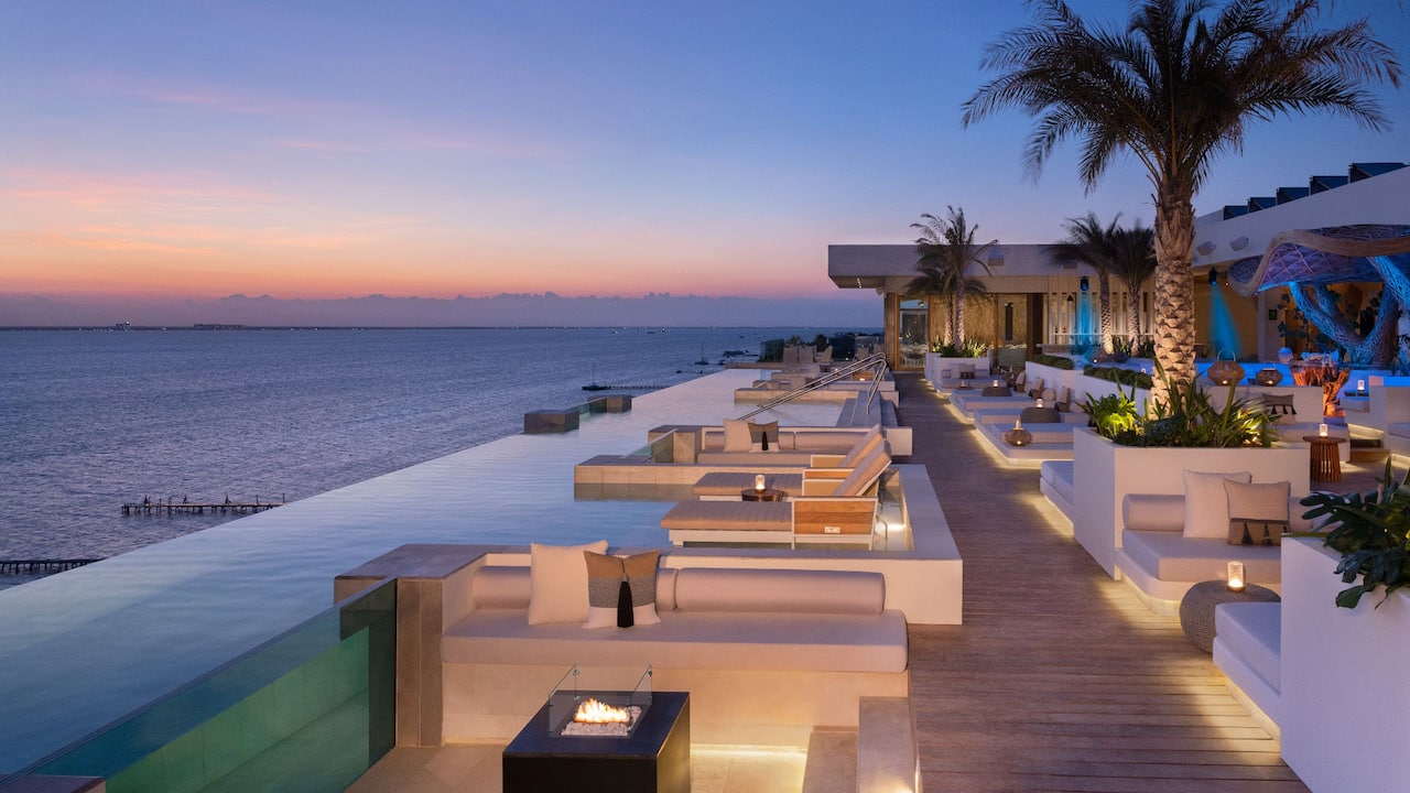 UNIK Rooftop Pool at Night