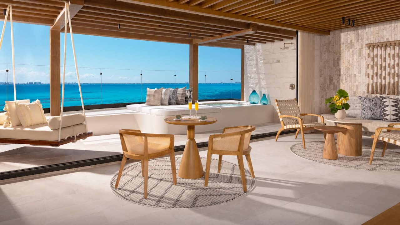 Honeymoon Ocean Front Suite Terrace and Living Area