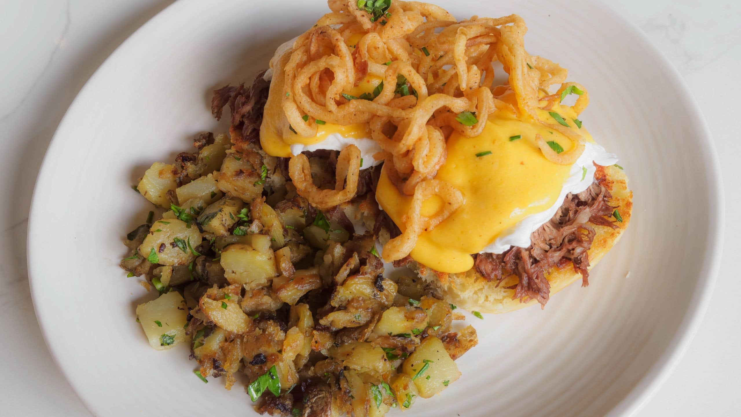 Hyatt Regency San Antonio Riverwalk Brisket Eggs Benedict