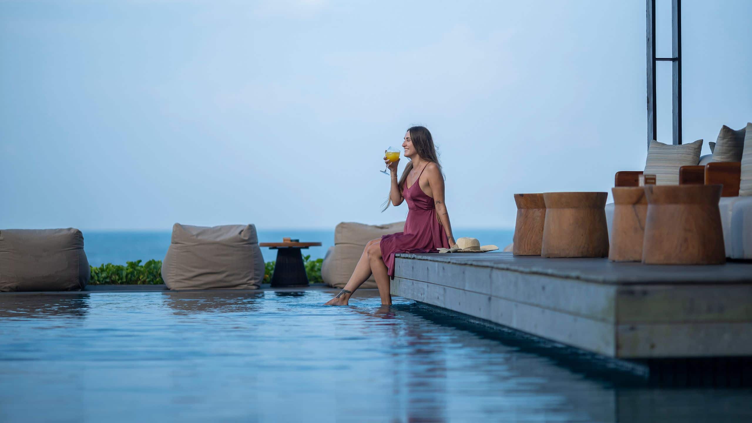 Alila Seminyak Woman Drink At Party Pool