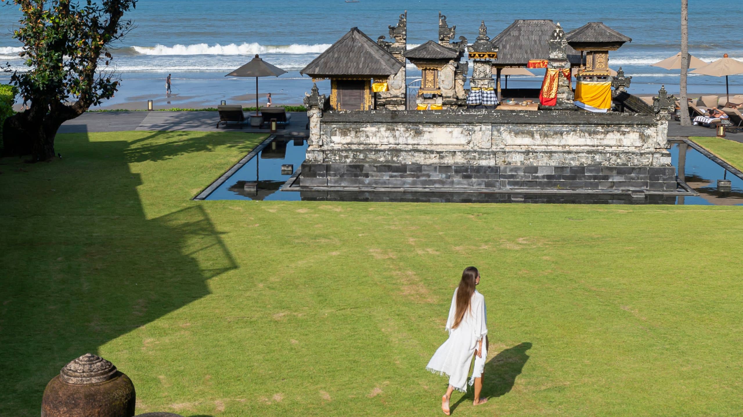 Alila Seminyak Women Running At Temple Garden
