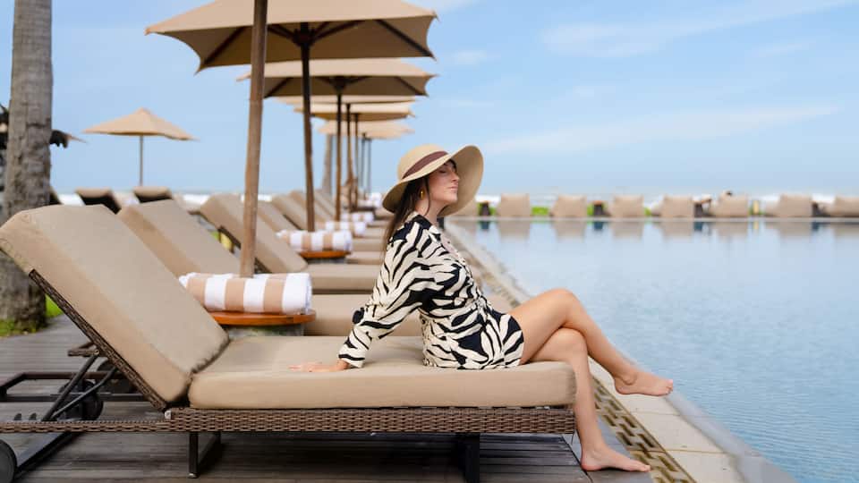 Woman Lounging on Sundeck