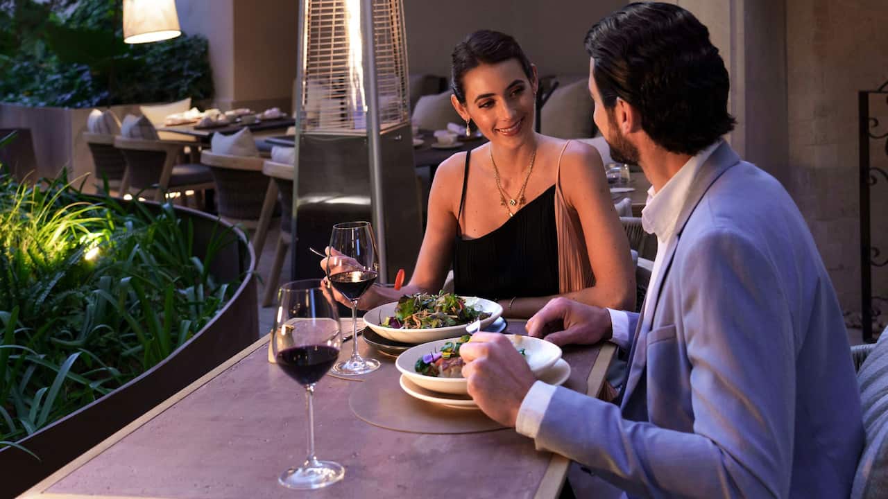 Couple Dining On Terrace