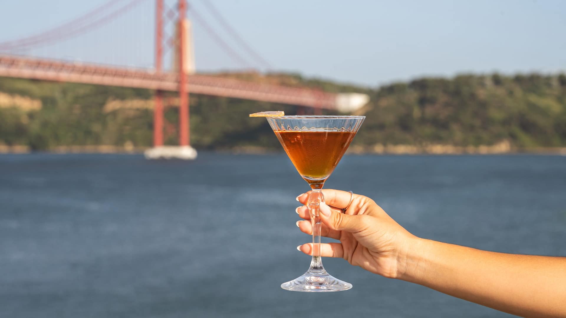 Hyatt Regency Lisbon Icon Rooftop Bar Cocktail in Hand