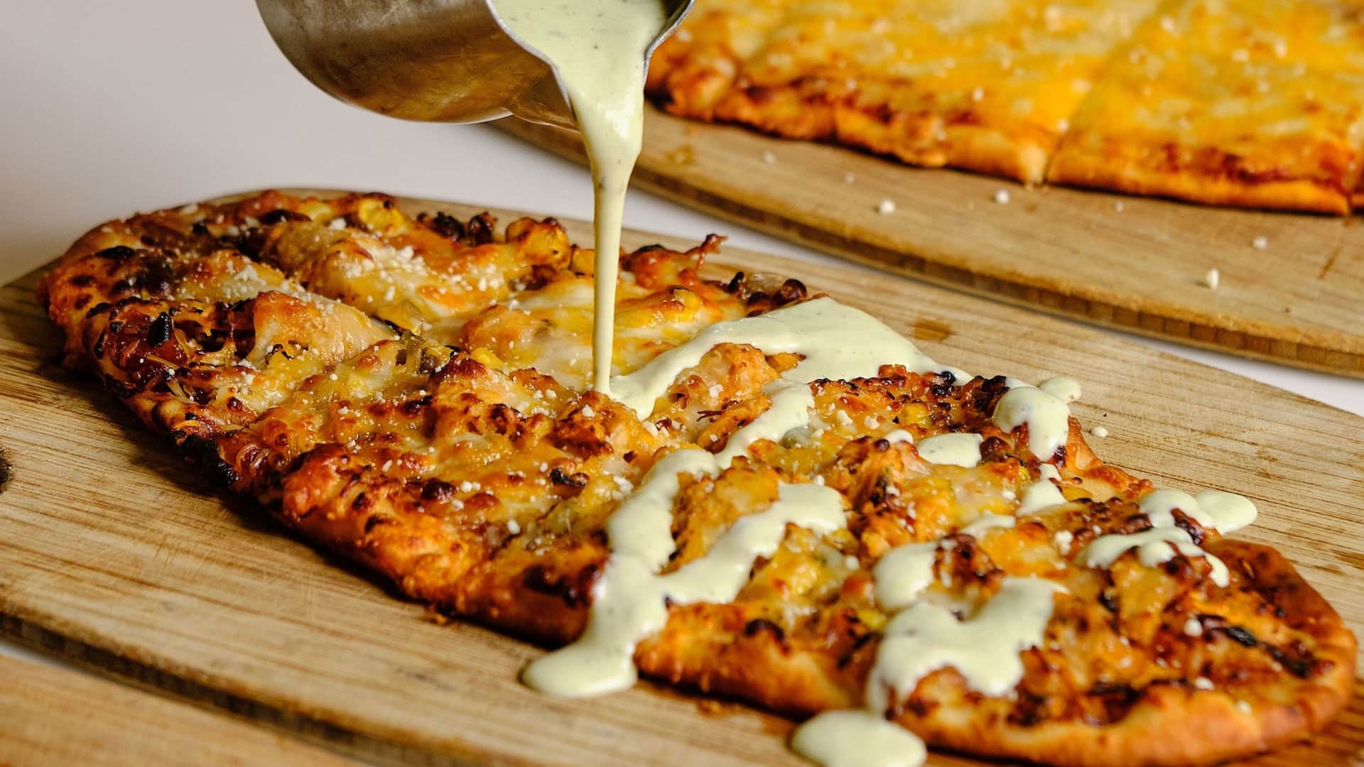 Hyatt Regency Jacksonville Riverfront Pizza Trio Sauce Drizzle
