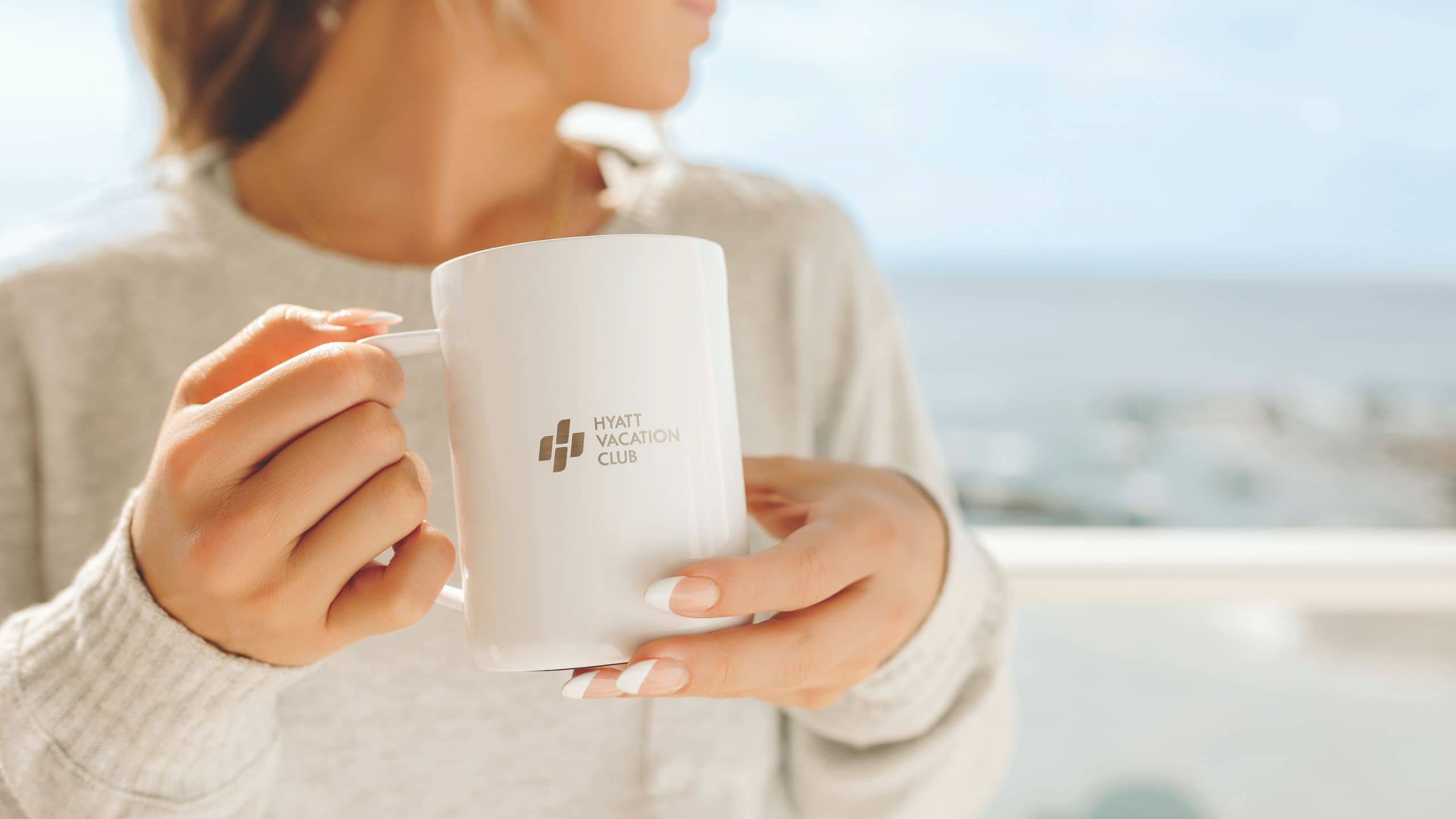 Sirena Del Mar Guest Holding Coffee Mug