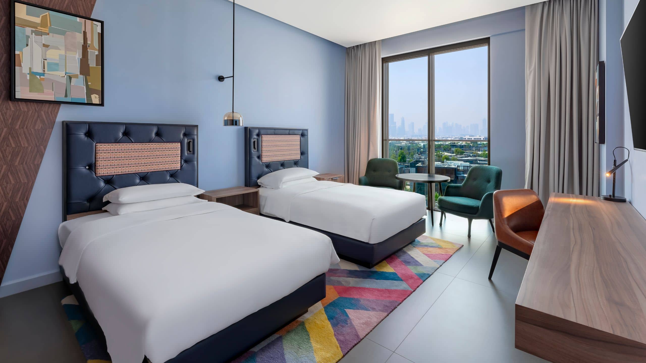 3 of 7 Hyatt Centric Jumeirah Dubai Twin Bed Skyline