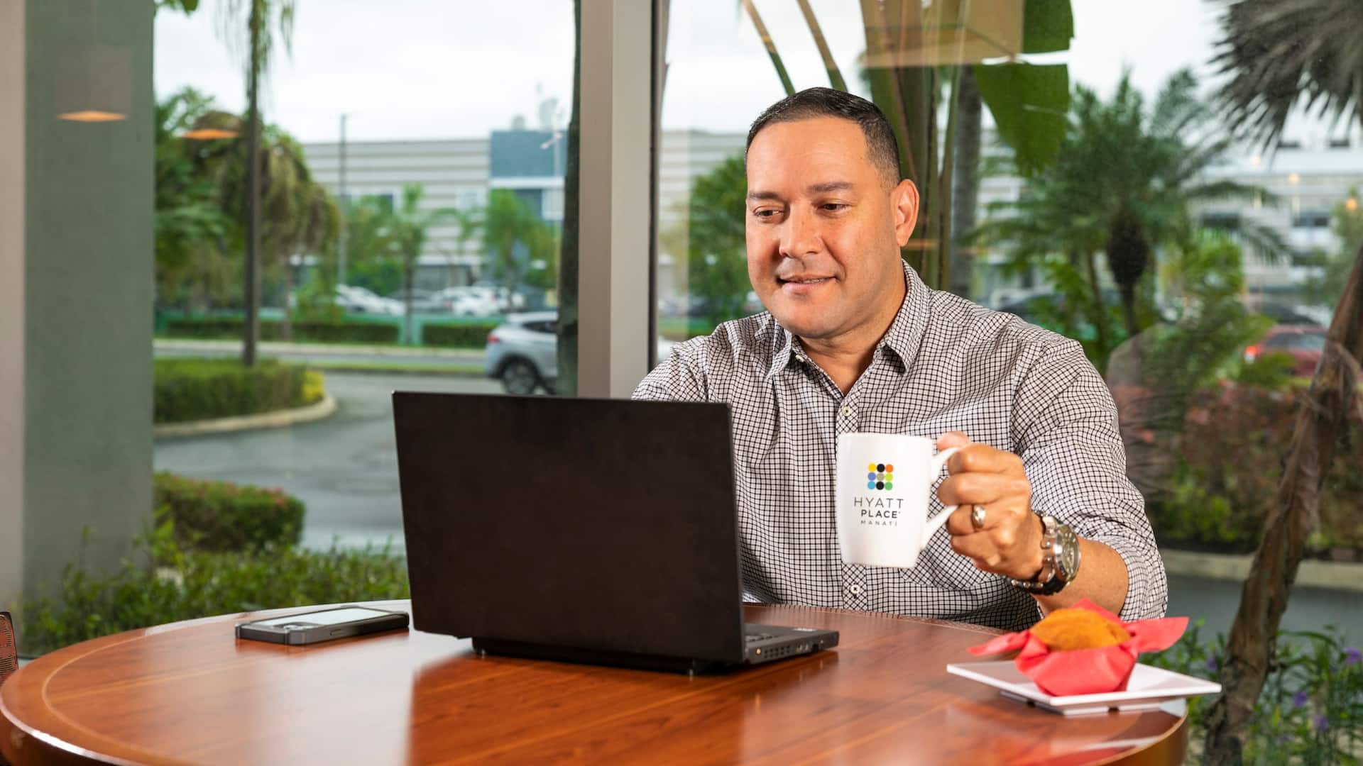 Hyatt Place Manatí Lifestyle Male Business With Coffee