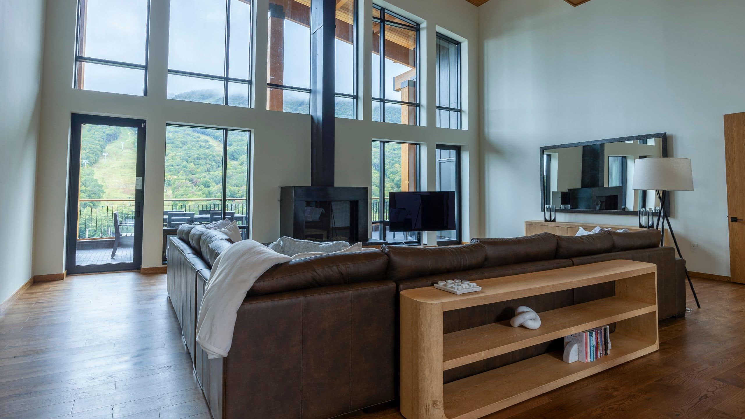 4 of 5 The Lodge at Spruce Peak OSP Five Bedroom Residence Living Room Television